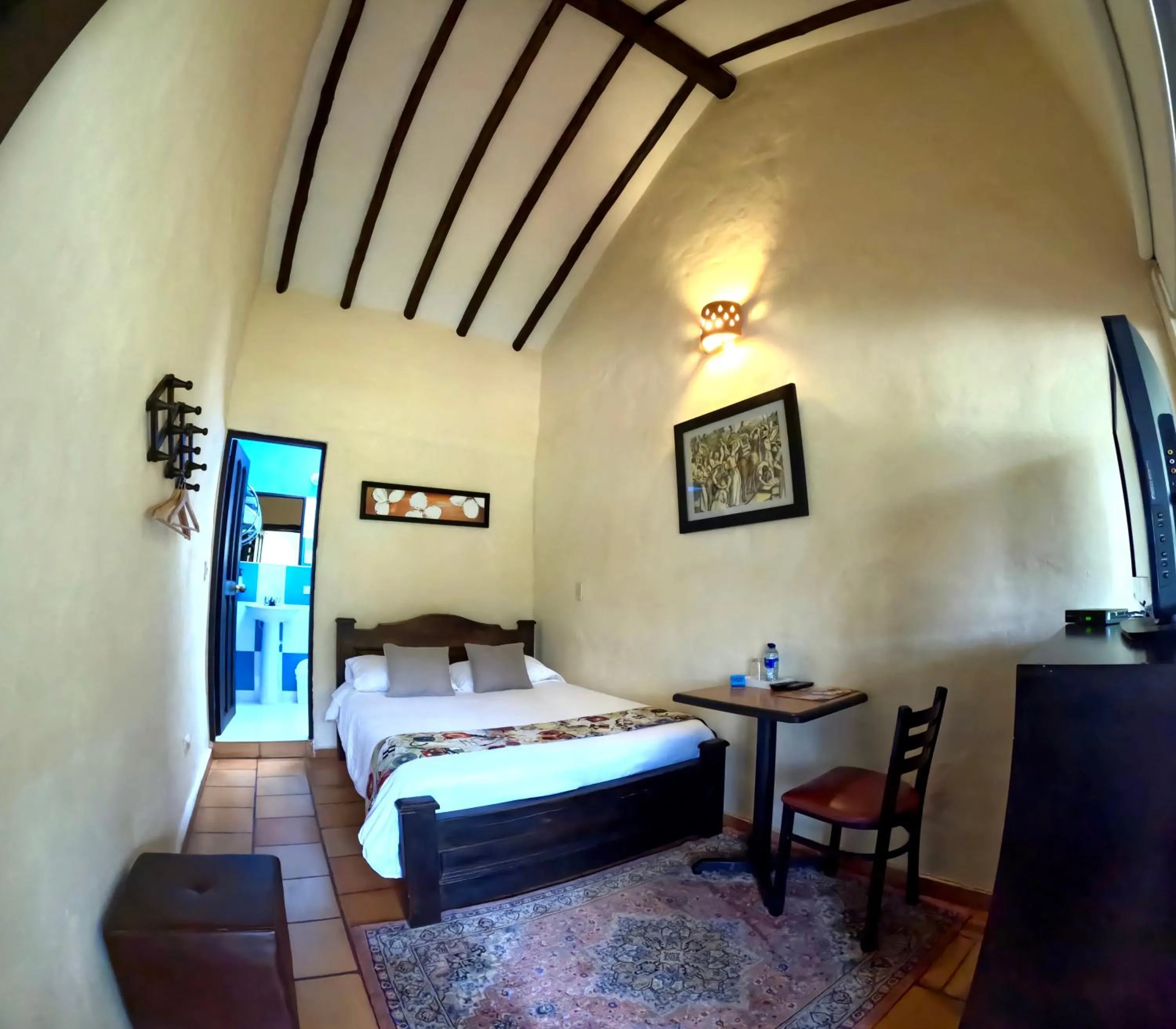 View (from property/room), Bed in Bombon Hotel