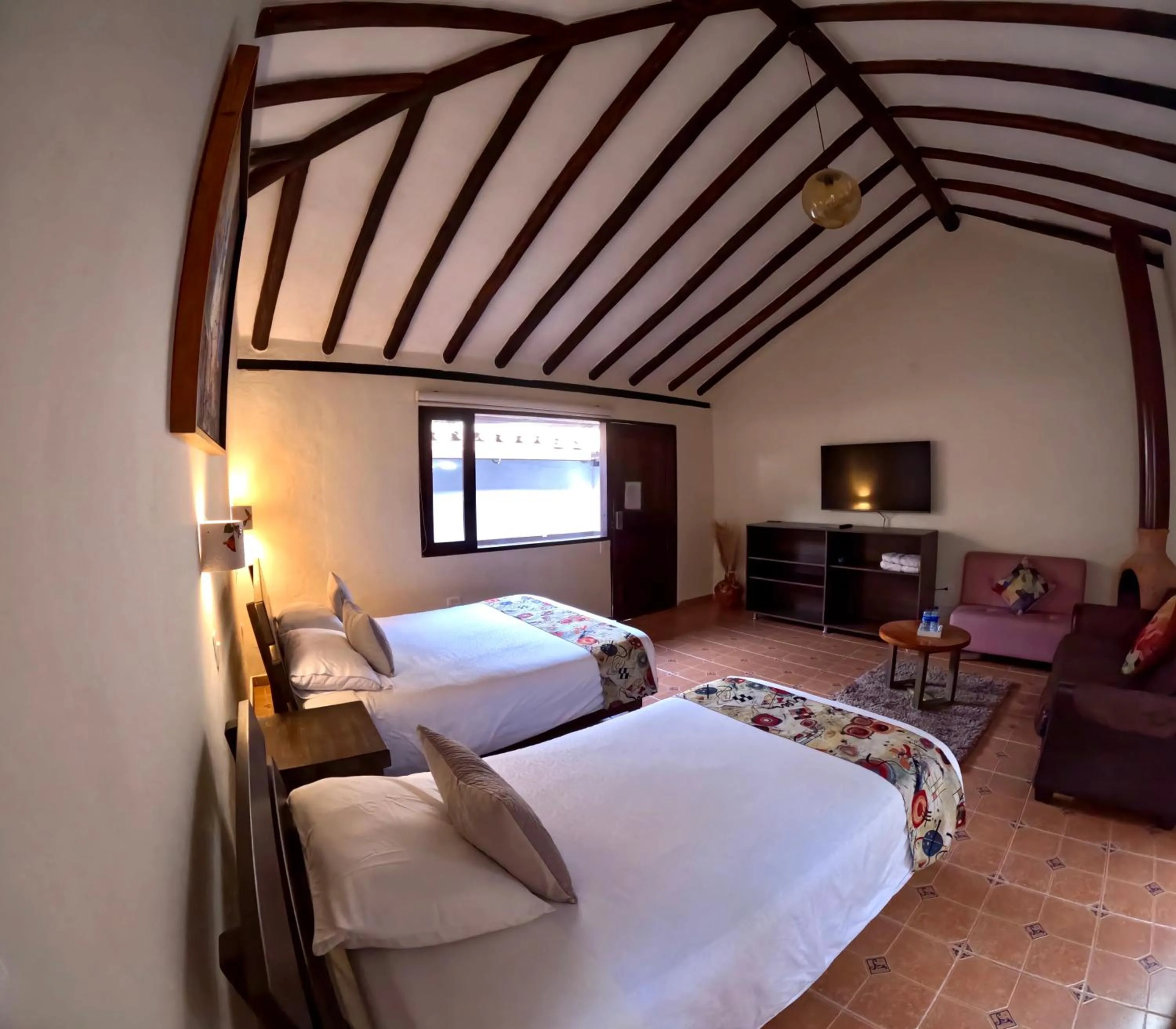 View (from property/room), Bed in Bombon Hotel