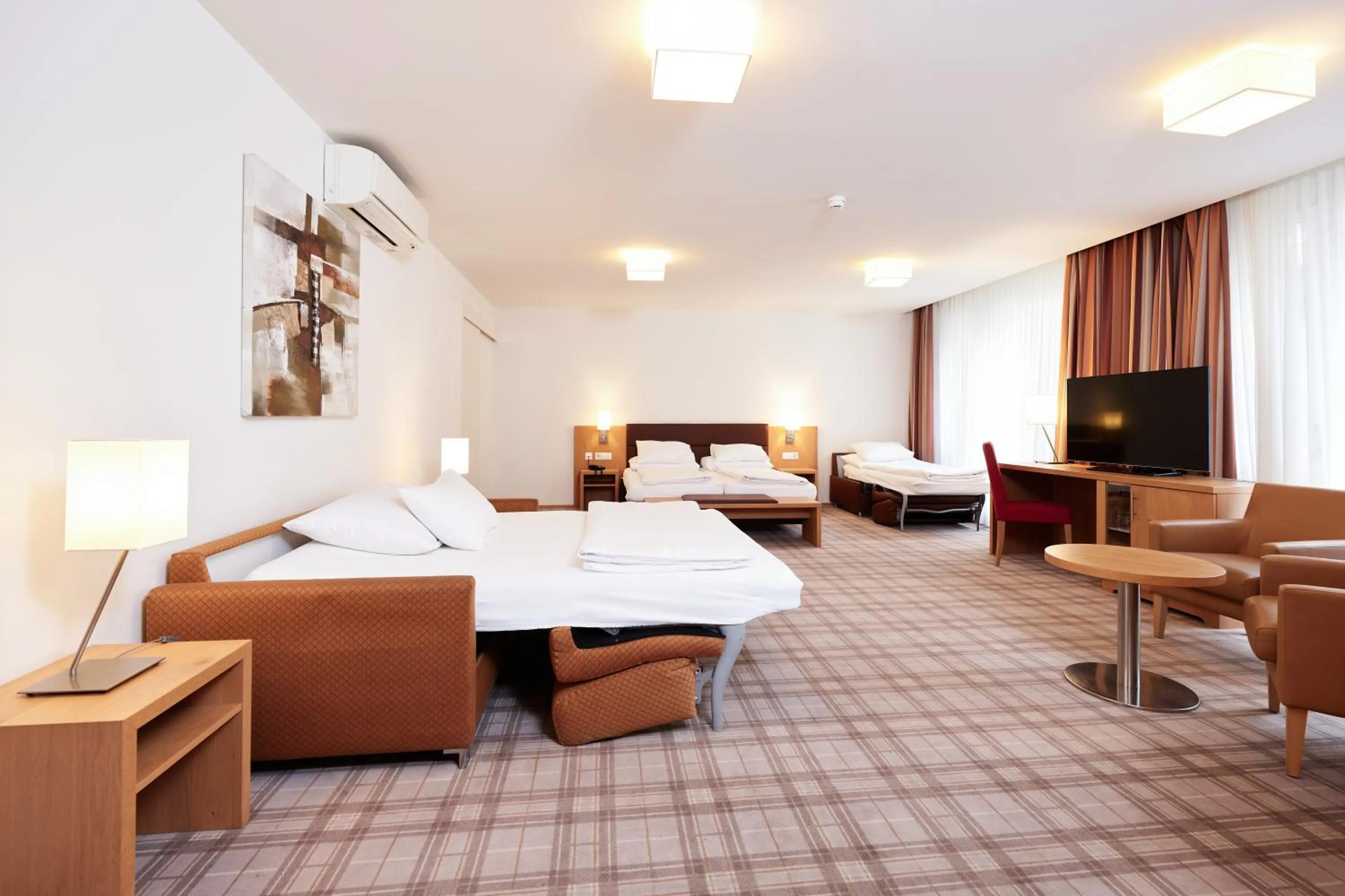 Bed in Central City Hotel Rochat