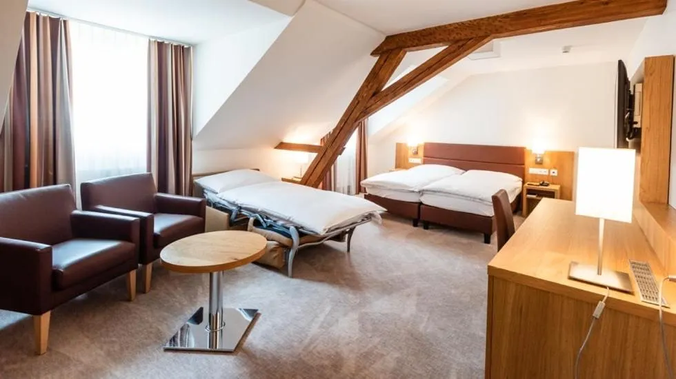 Photo of the whole room, Bed in Central City Hotel Rochat