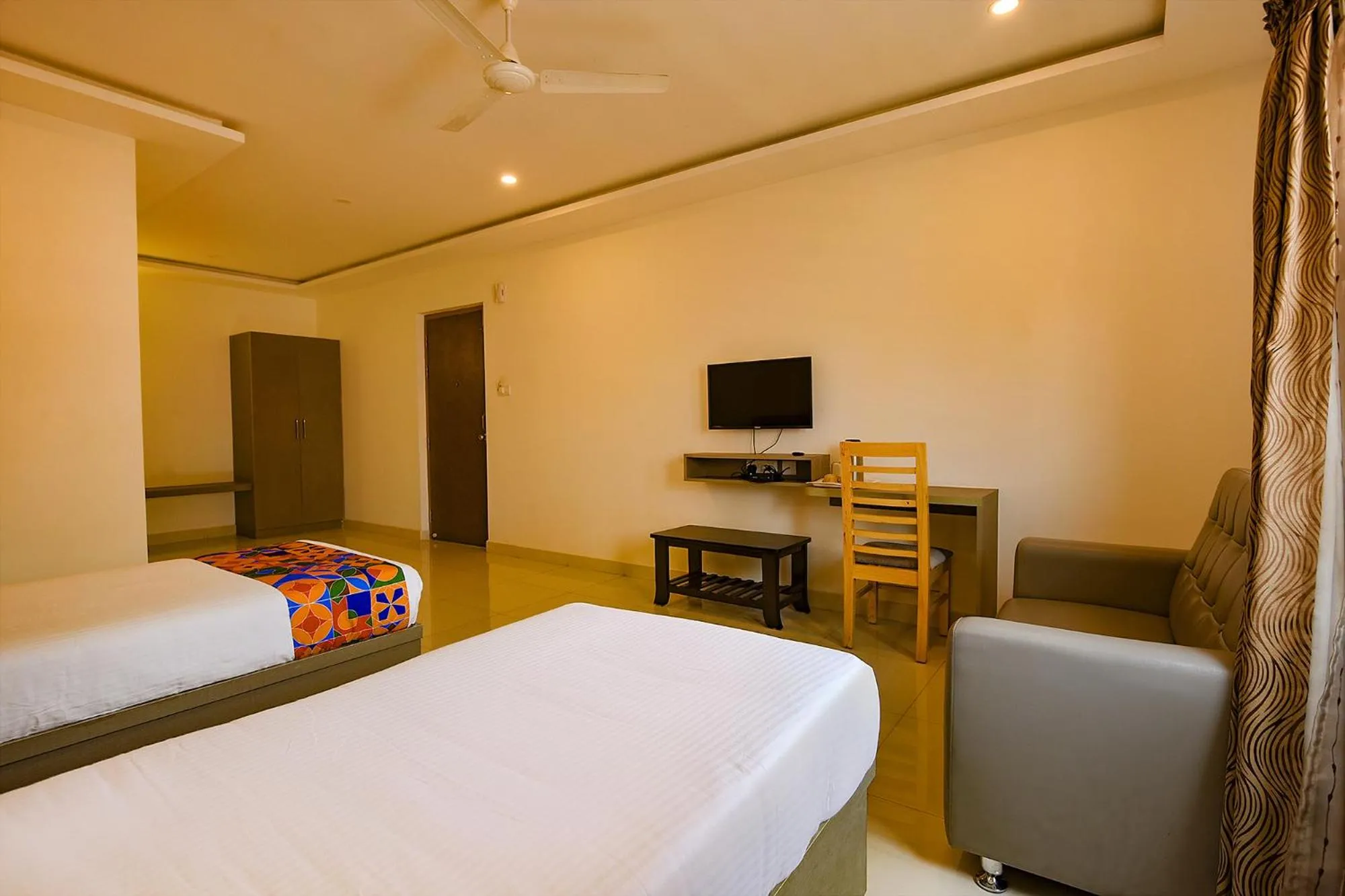 Living room, Bed in FabHotel Champion Gateway - Yelahanka