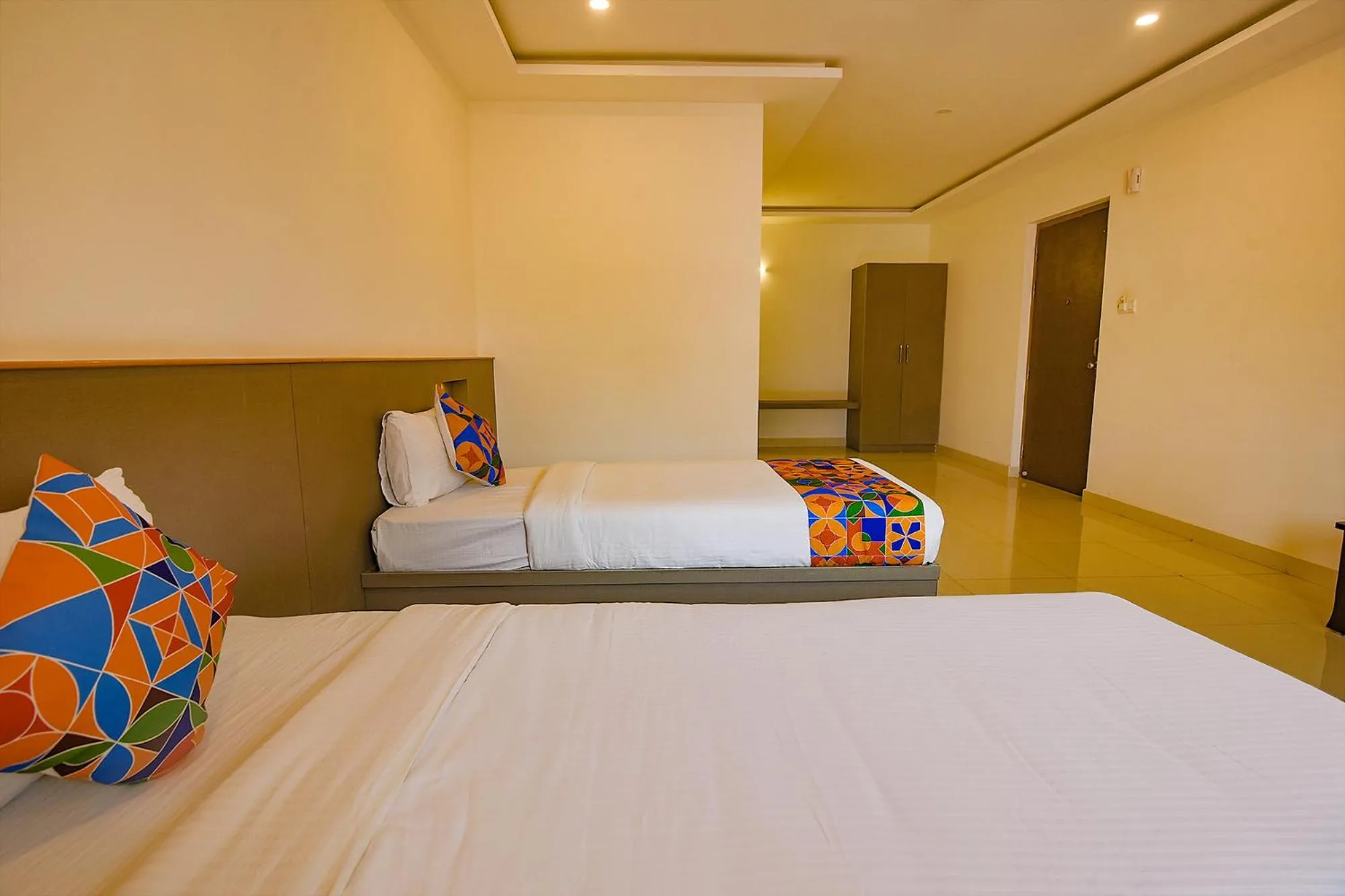 Bed in FabHotel Champion Gateway - Yelahanka