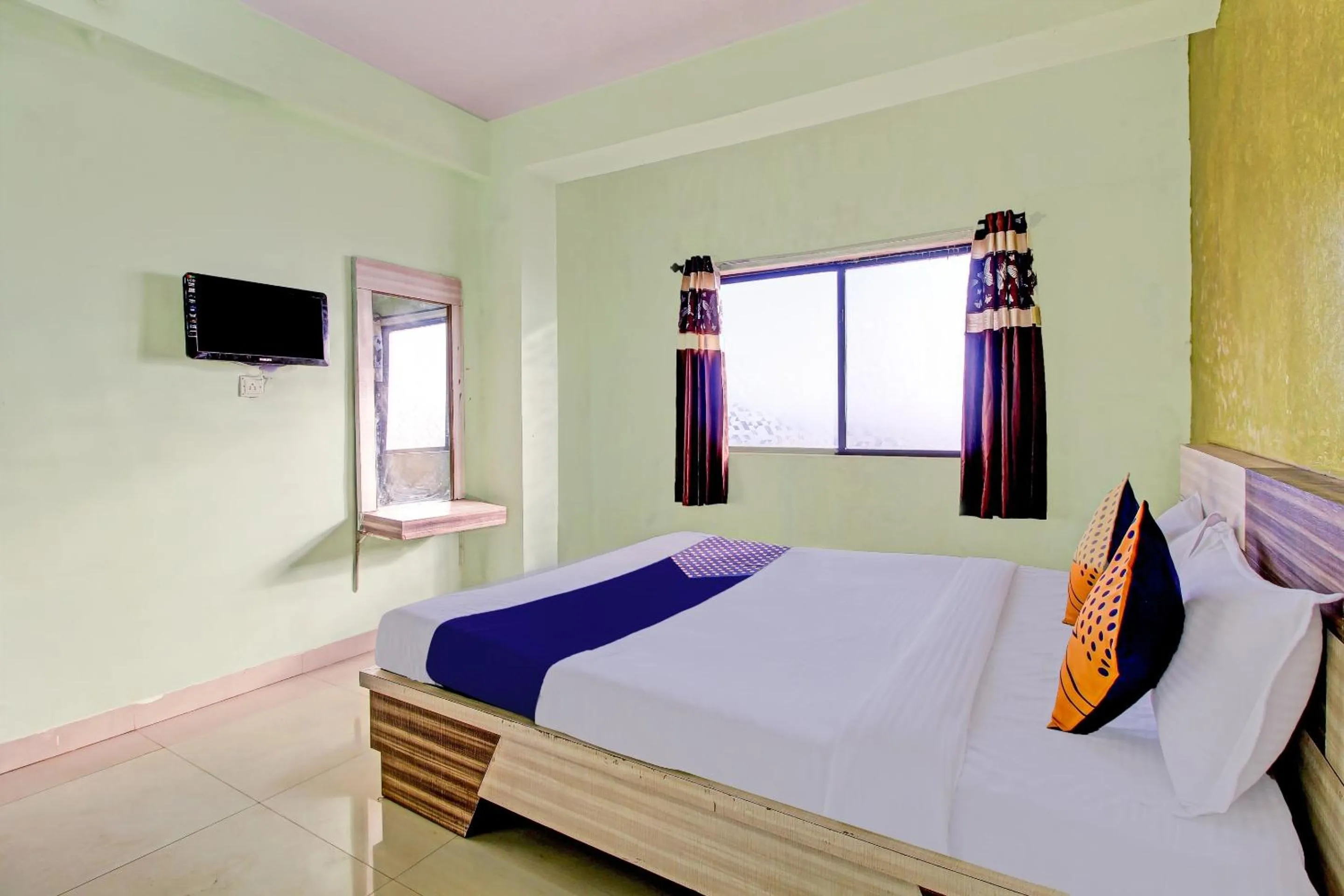 Bedroom in SPOT ON Shreekrupa