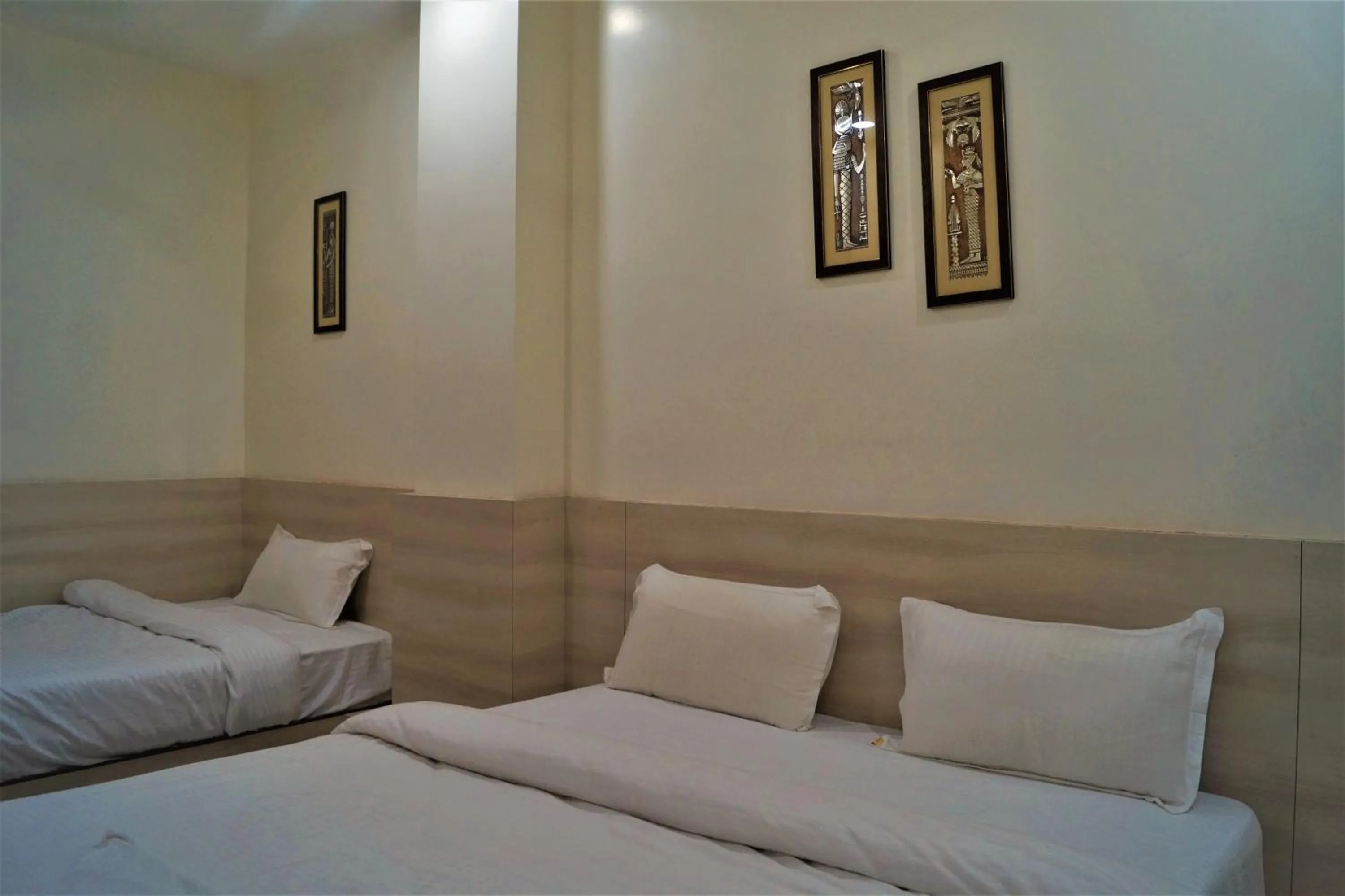 Bed in Hotel Shree Shyam International