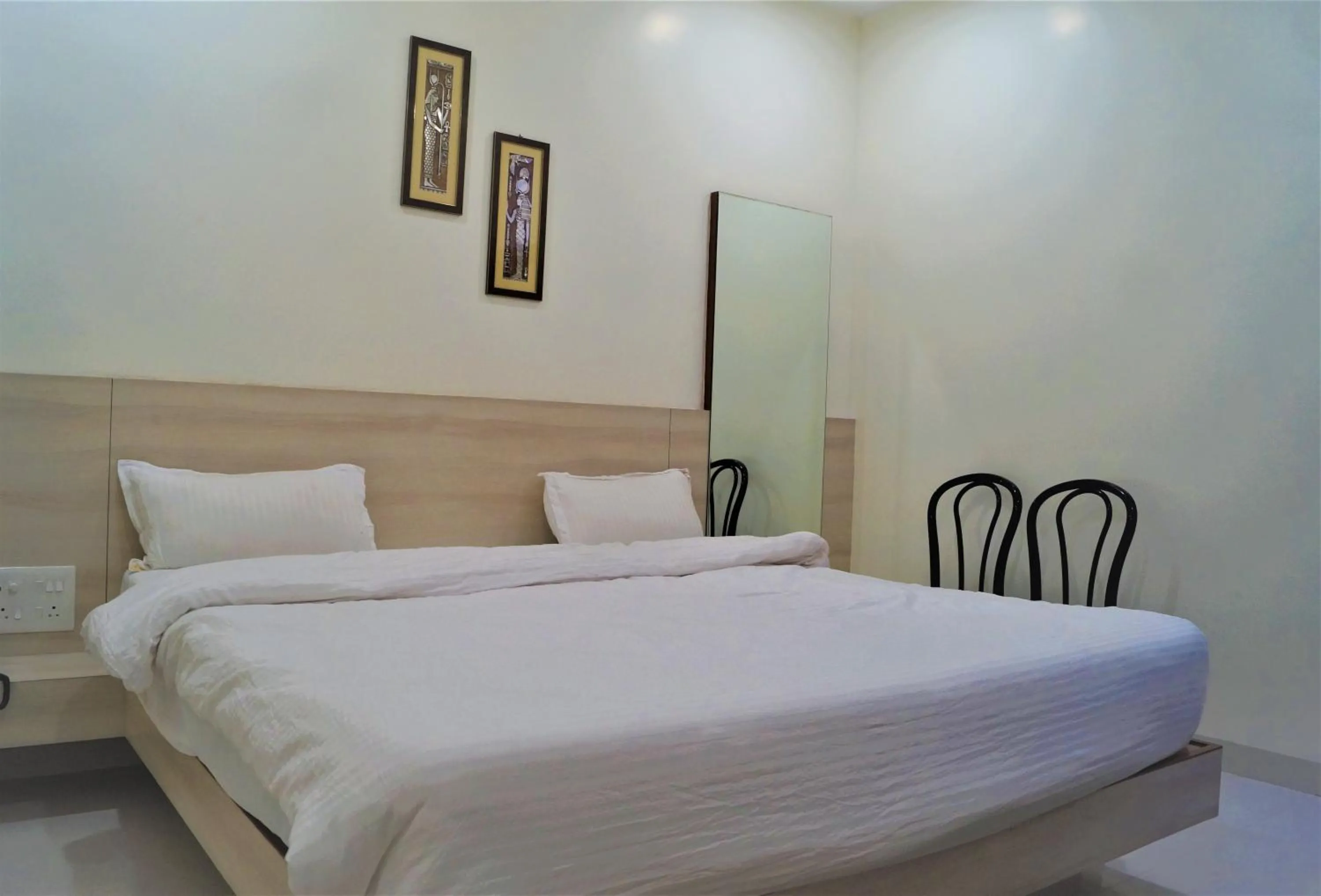 Bed in Hotel Shree Shyam International