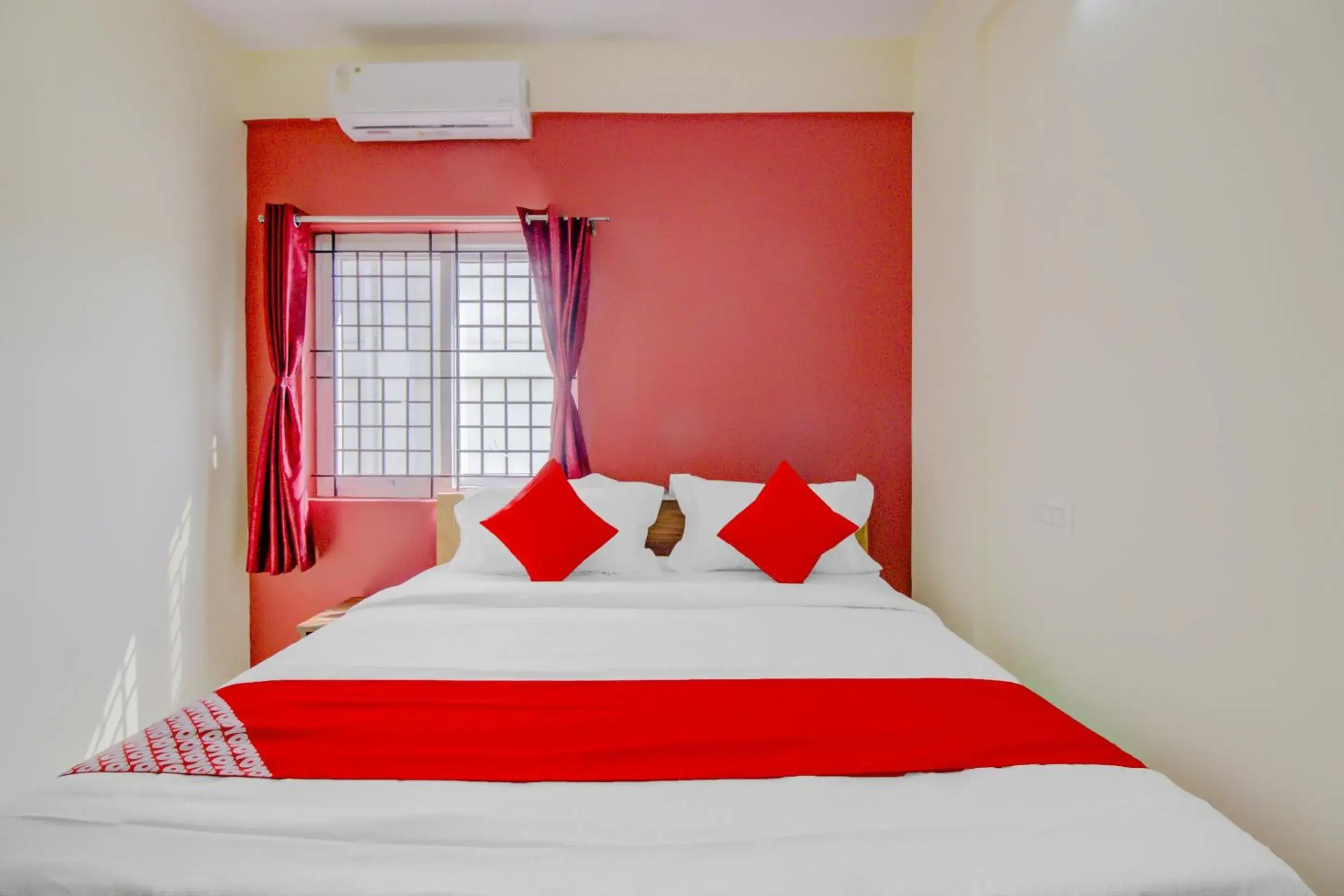 Bedroom in Hotel O Nelli Suites Bedroom in Hotel O Nelli Suites