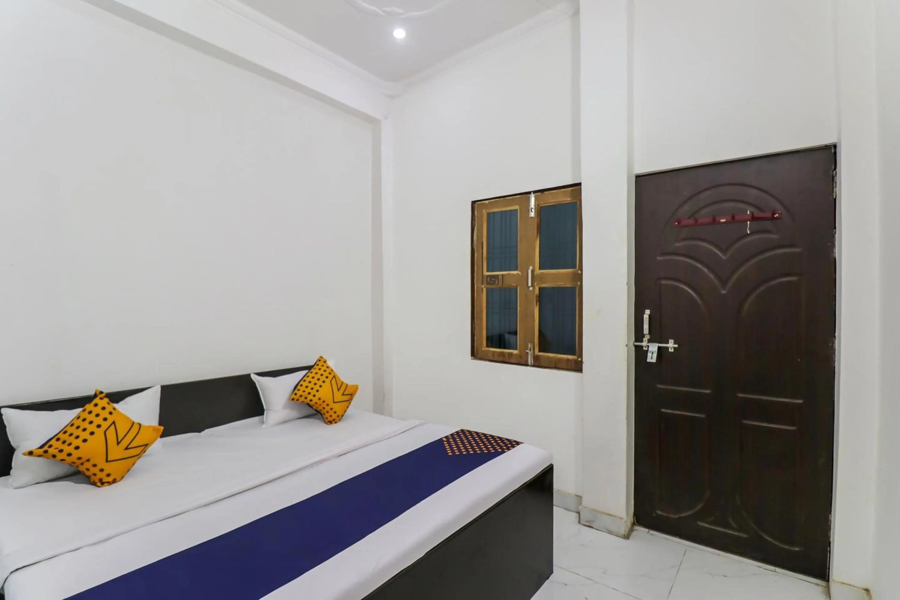 Bedroom, Bed in Hotel O Rajdhani Hotel