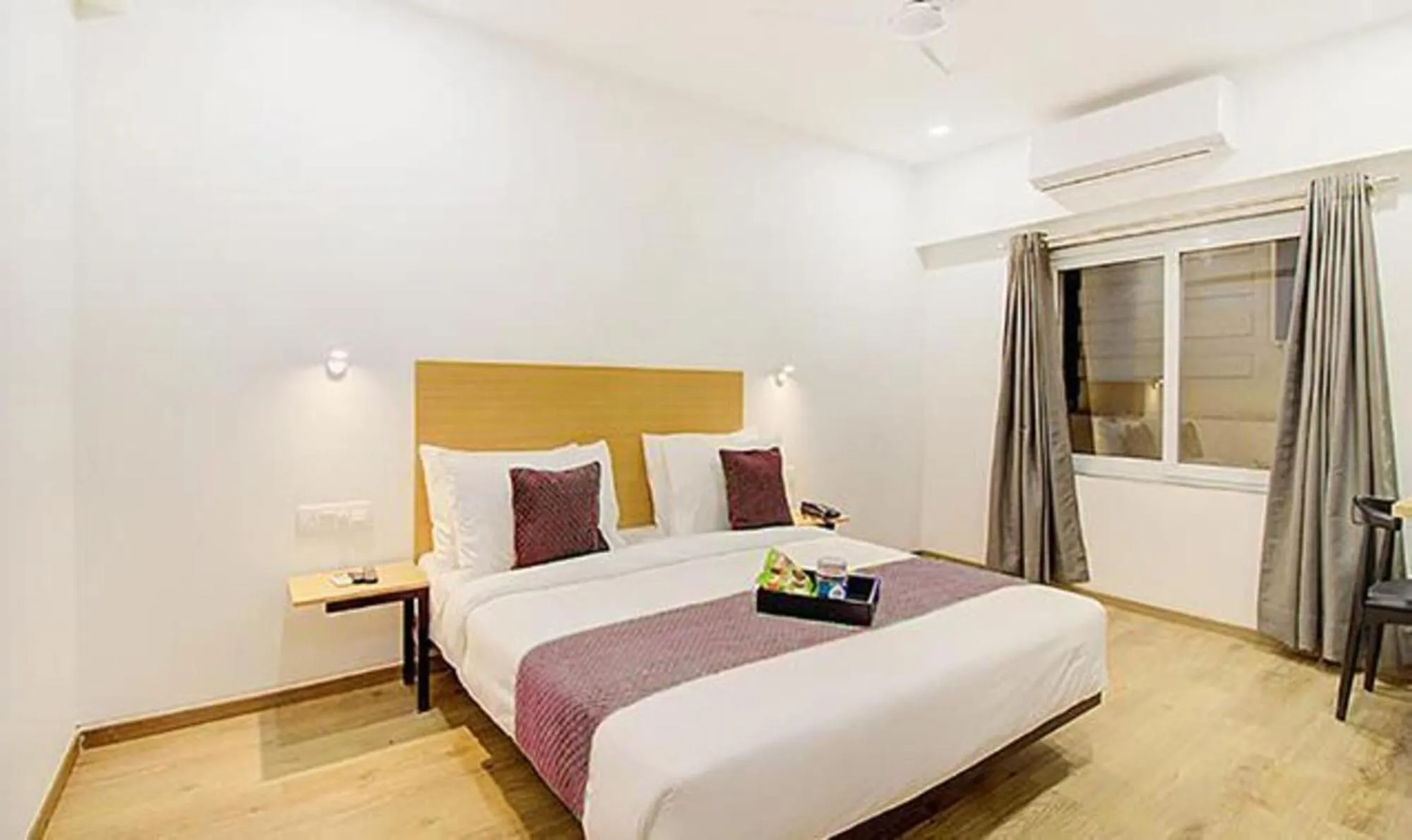 Photo of the whole room, Bed in FabHotel Ashray Residency