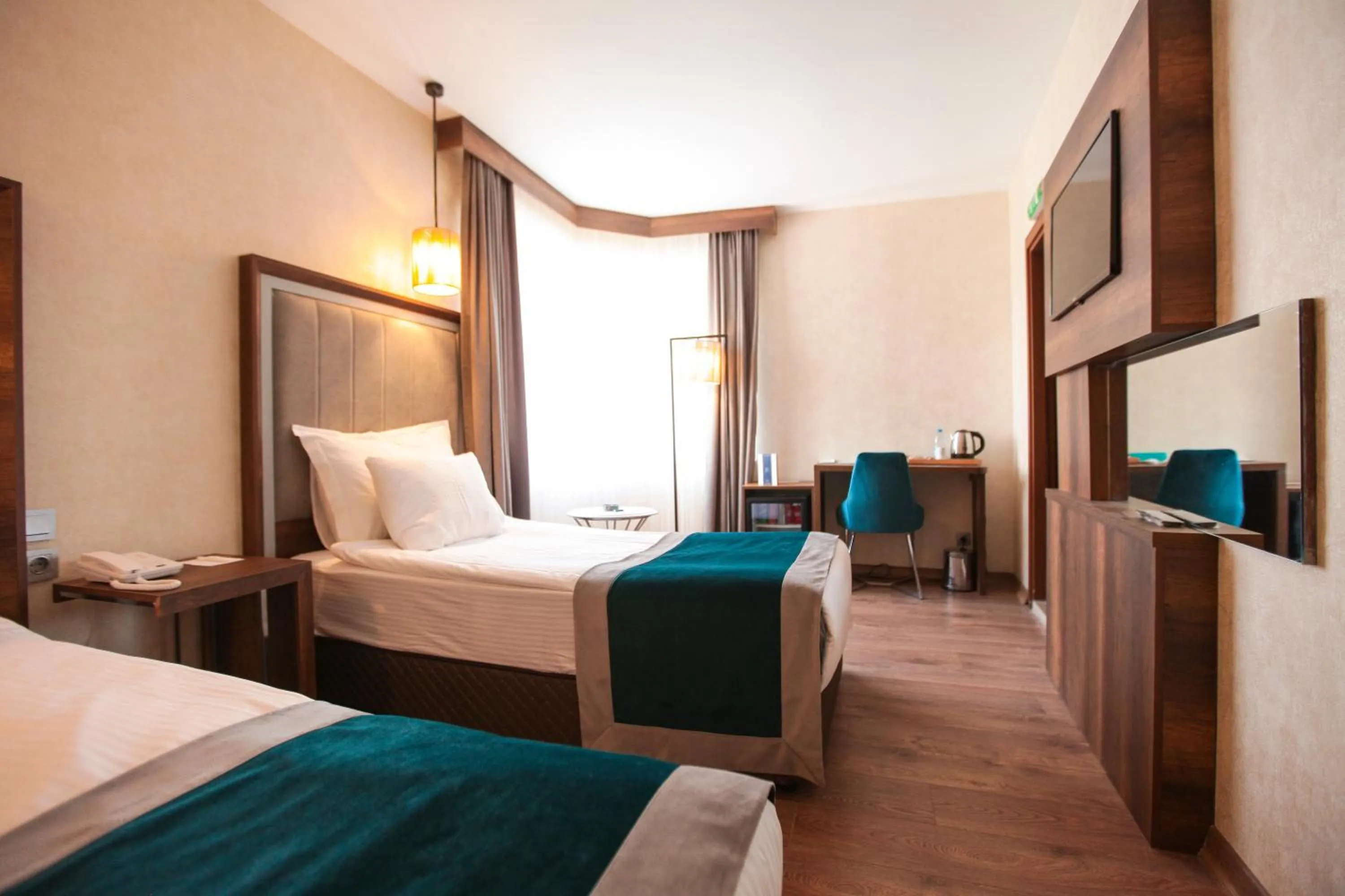 Bed in The Life Hotel & Spa