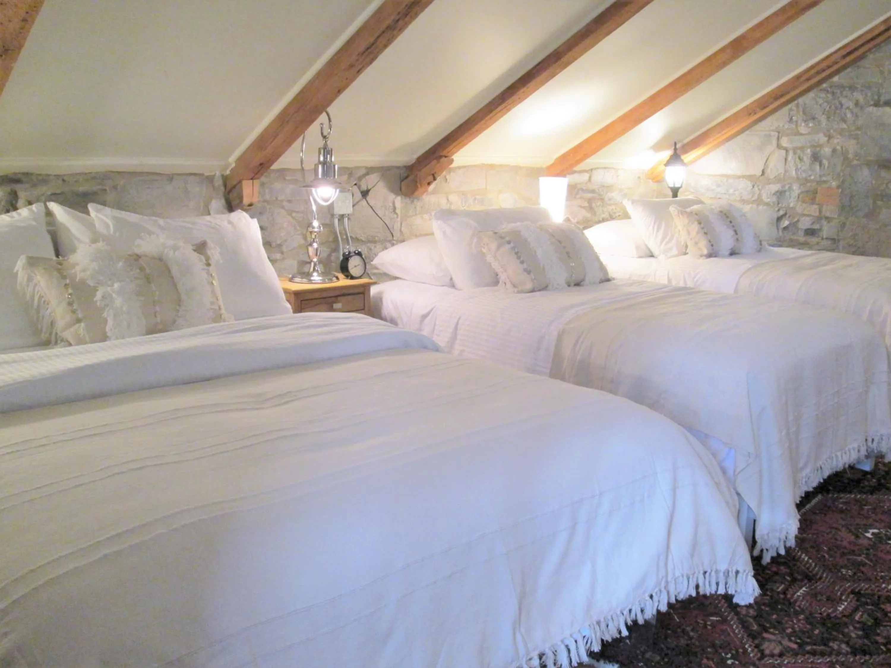 Bedroom, Bed in All Suites Whitney Manor