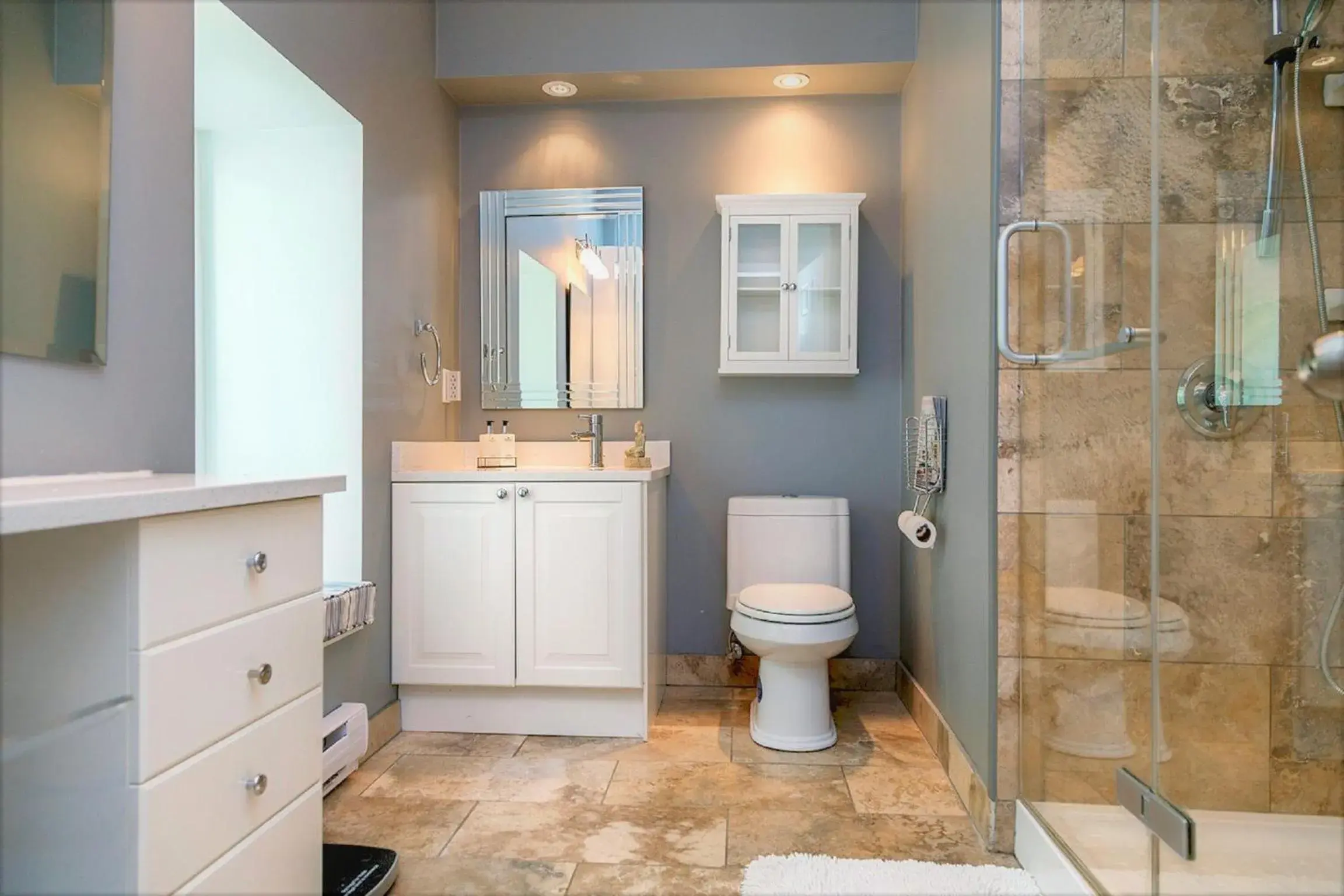 Shower in All Suites Whitney Manor Shower in All Suites Whitney Manor