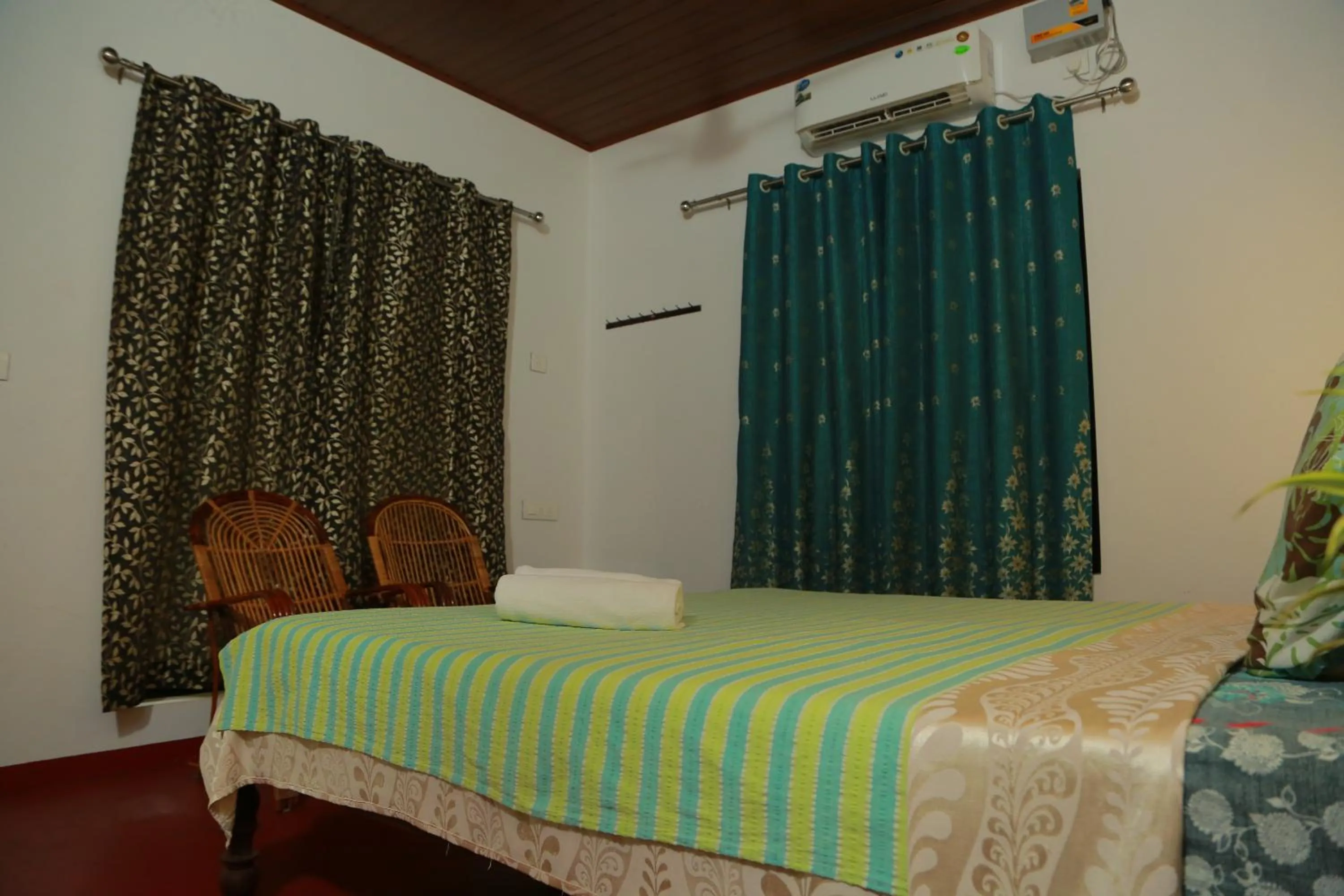 Bed in Marari Charlys Homestay