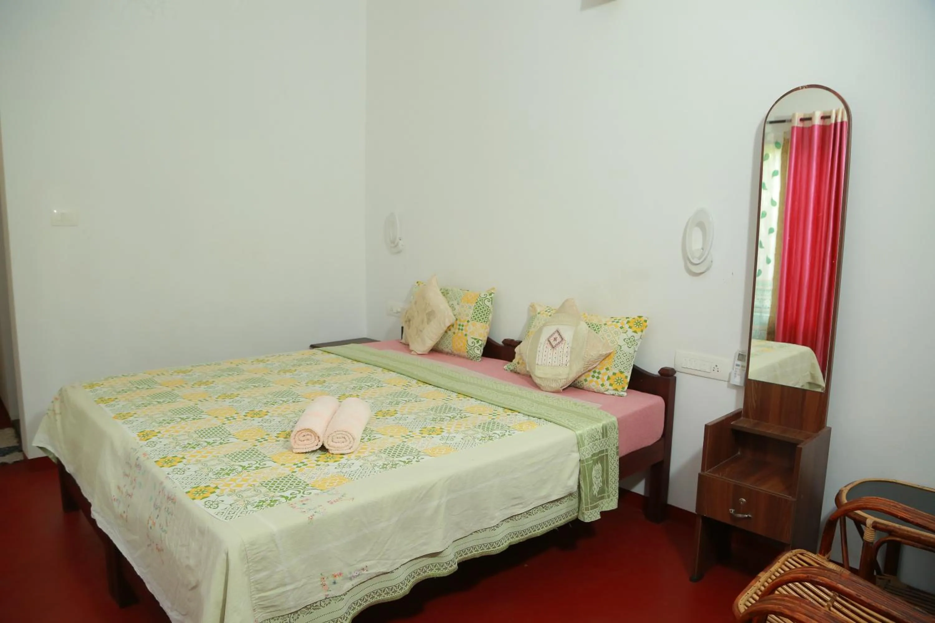 Bed in Marari Charlys Homestay