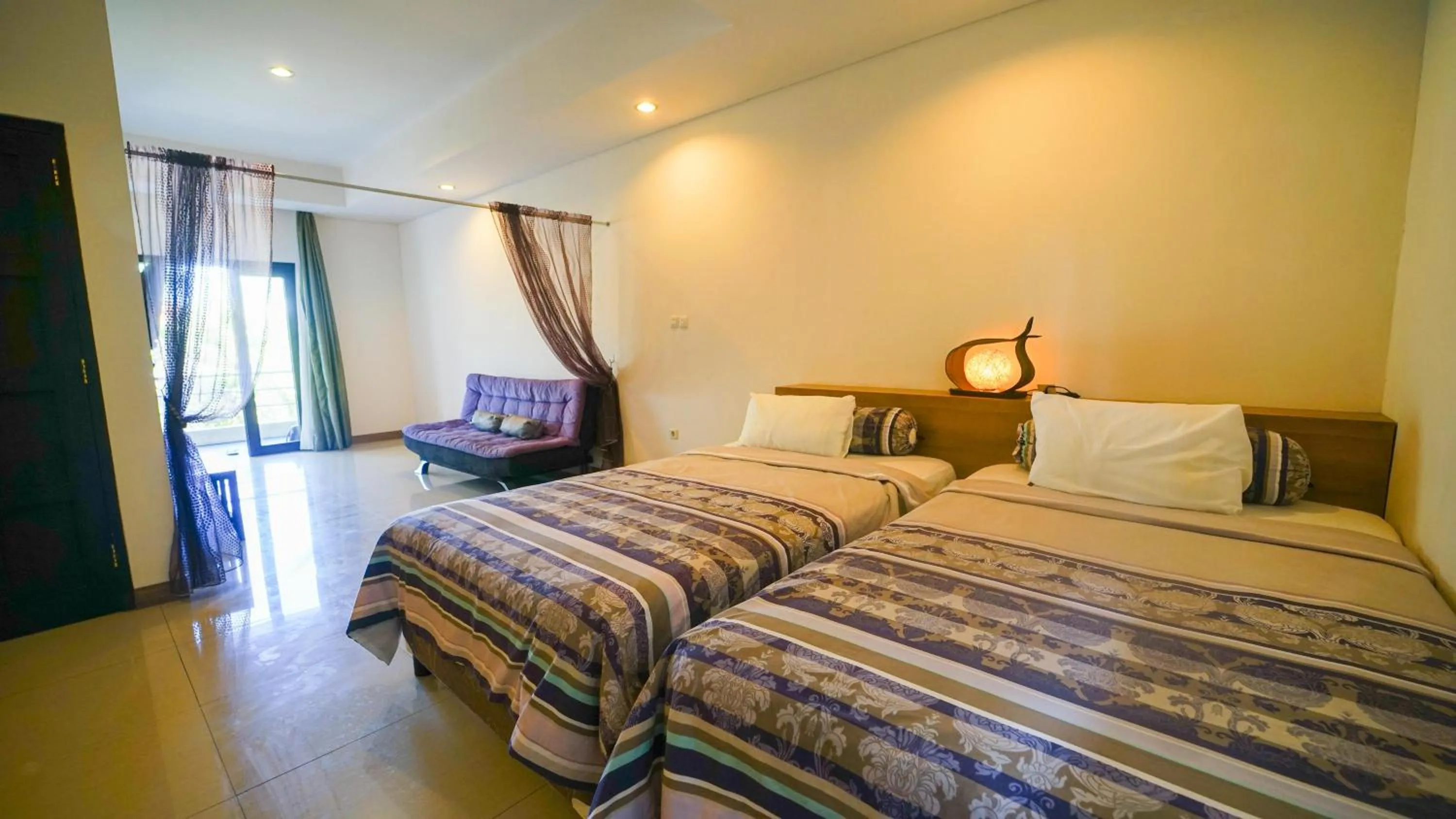 Bedroom, Bed in Alit Beach Resort and Villas