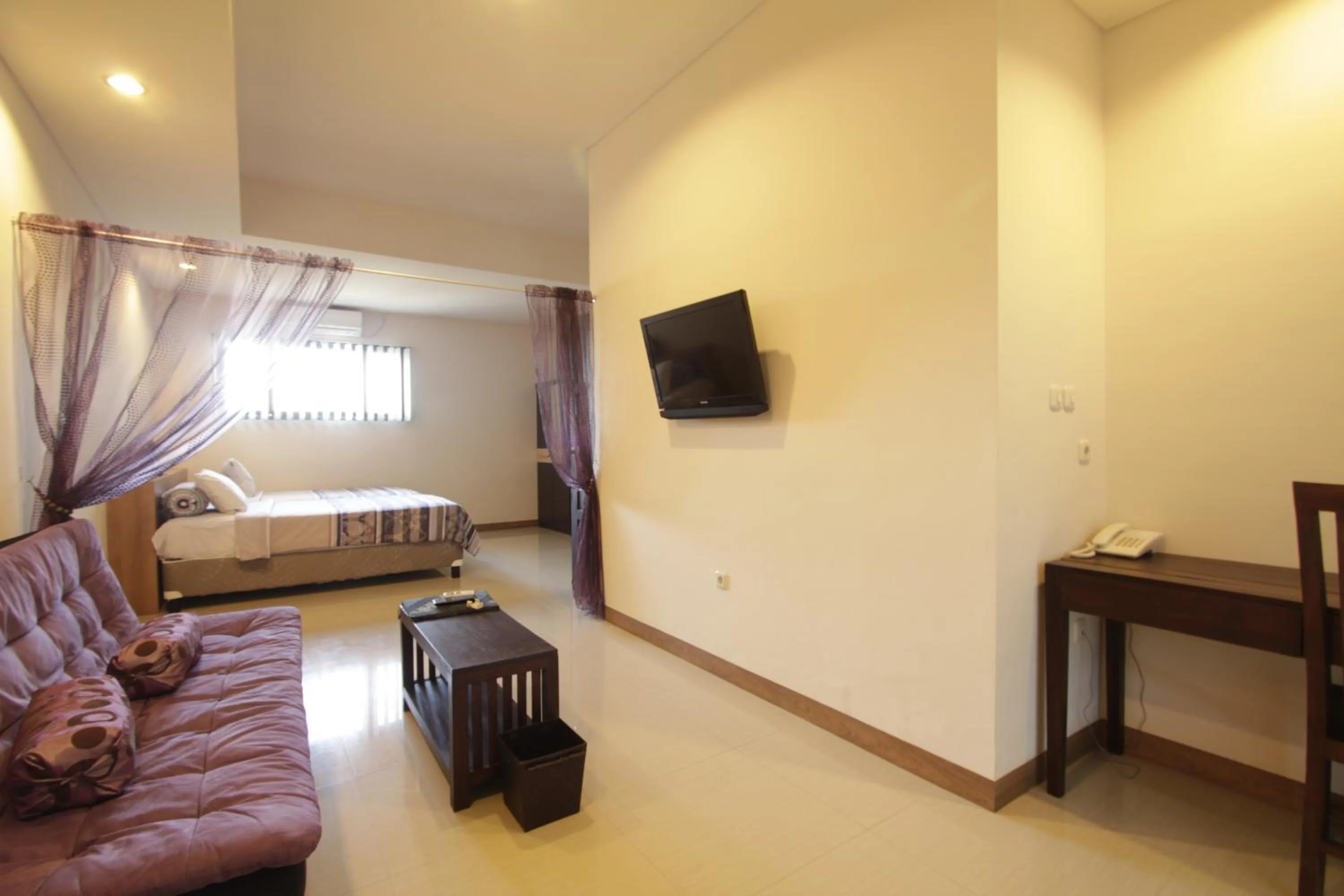 Bedroom in Alit Beach Resort and Villas