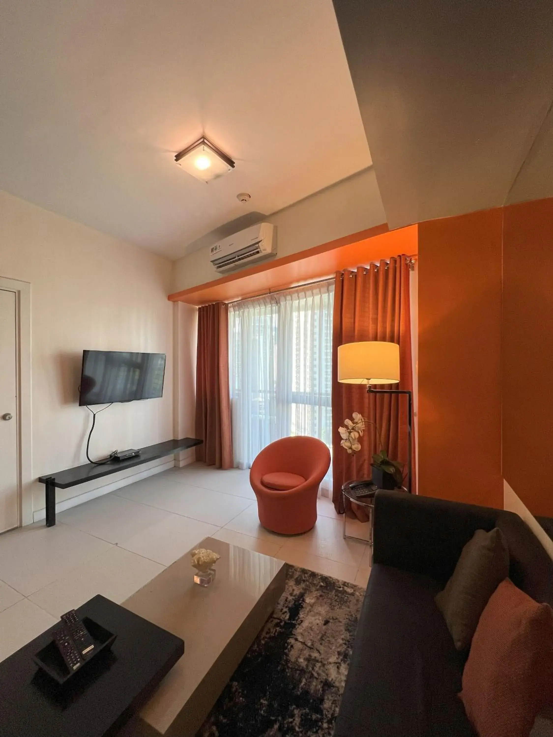 Communal lounge/ TV room in KL Serviced Residences Managed by HII Communal lounge/ TV room in KL Serviced Residences Managed by HII