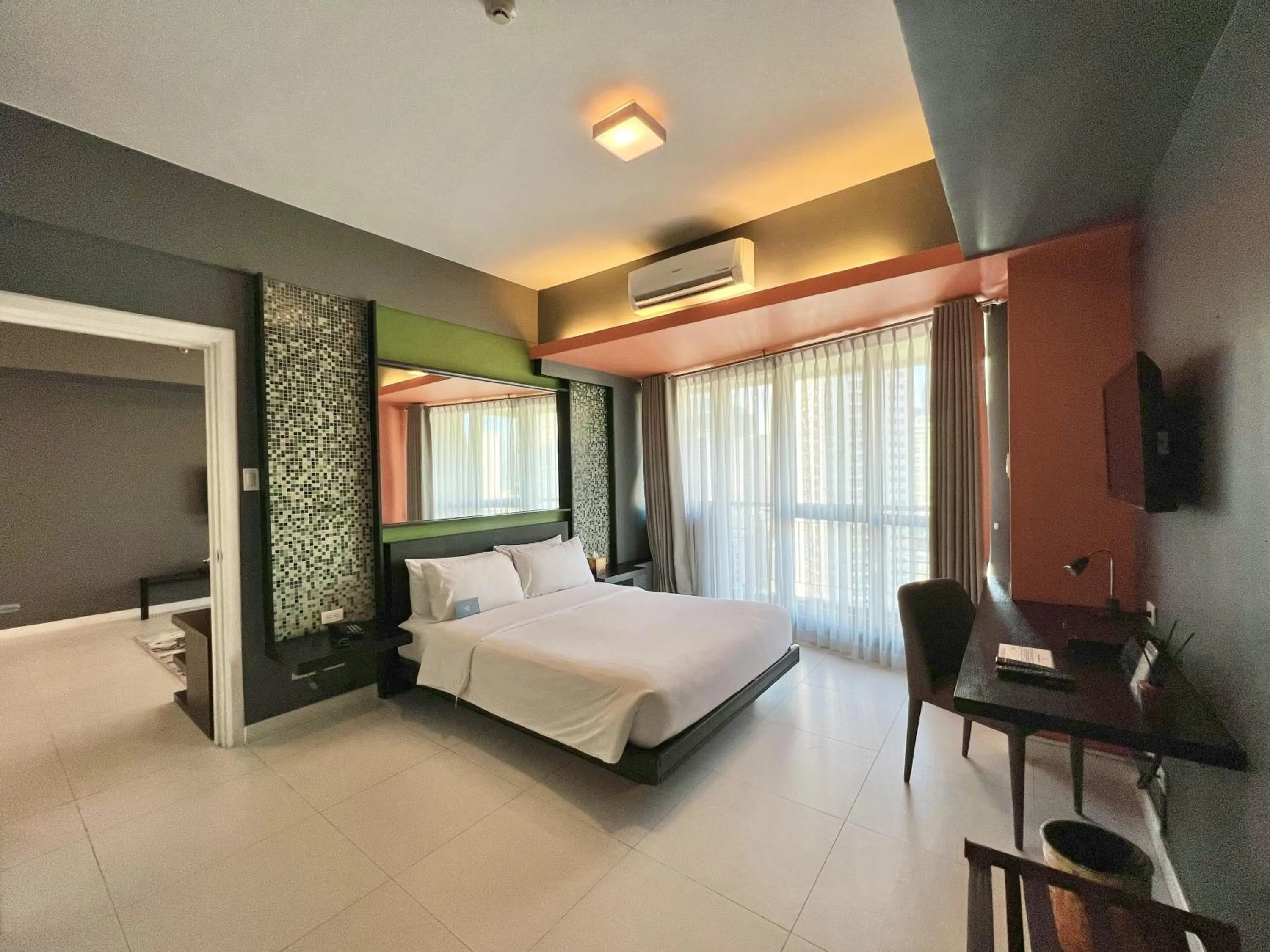Communal lounge/ TV room, Bed in KL Serviced Residences Managed by HII