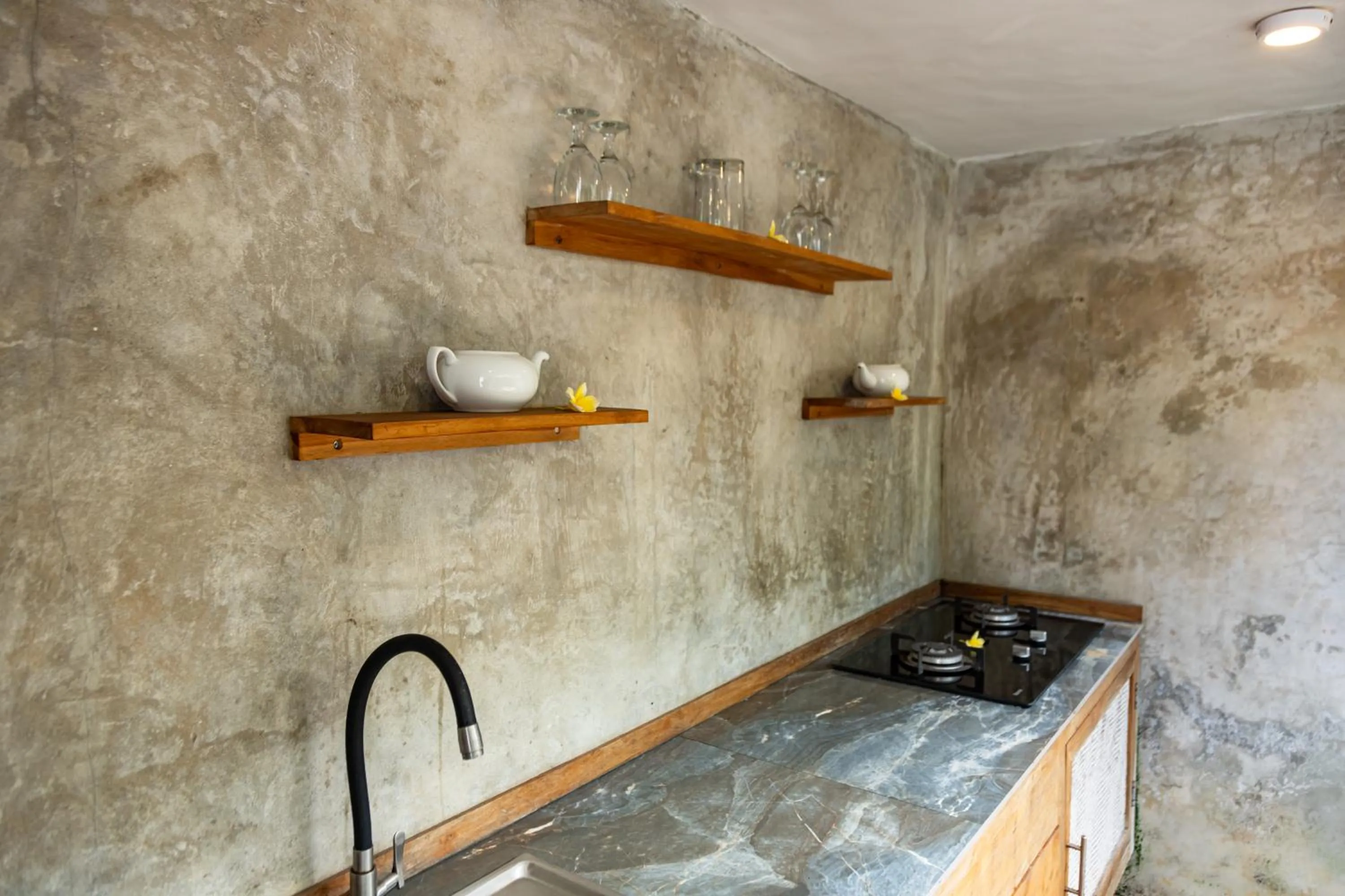 Kitchen or kitchenette in Reswaha Villas by GenuineHost