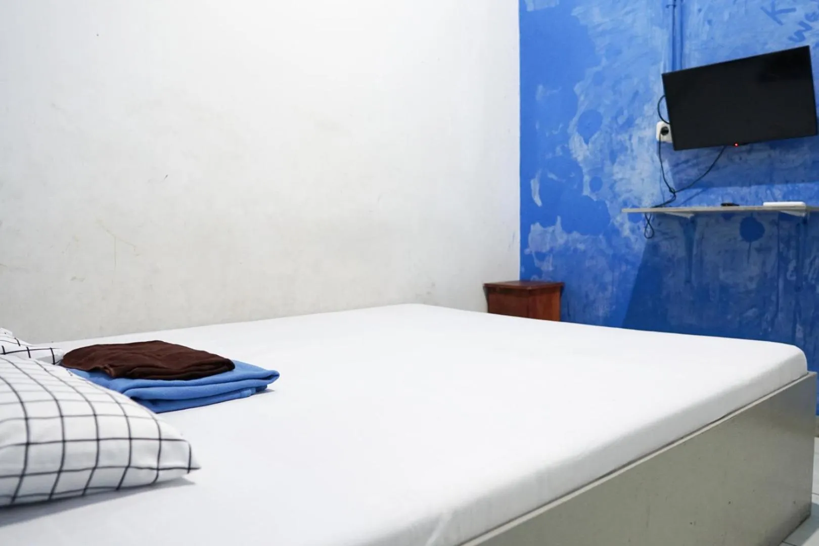 Bed in Cosmo Tanjung Duren Mitra RedDoorz