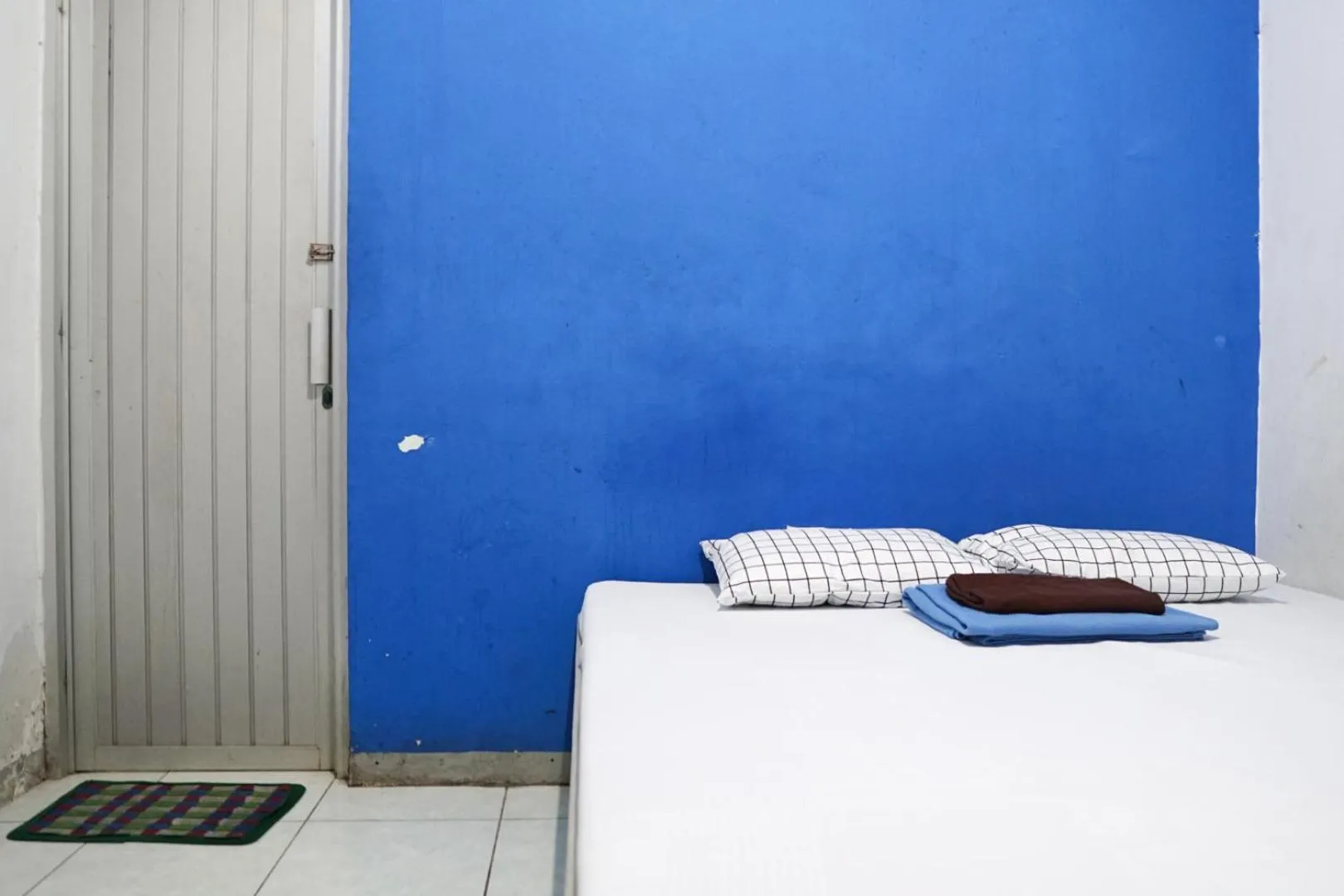 Bedroom in Cosmo Tanjung Duren Mitra RedDoorz