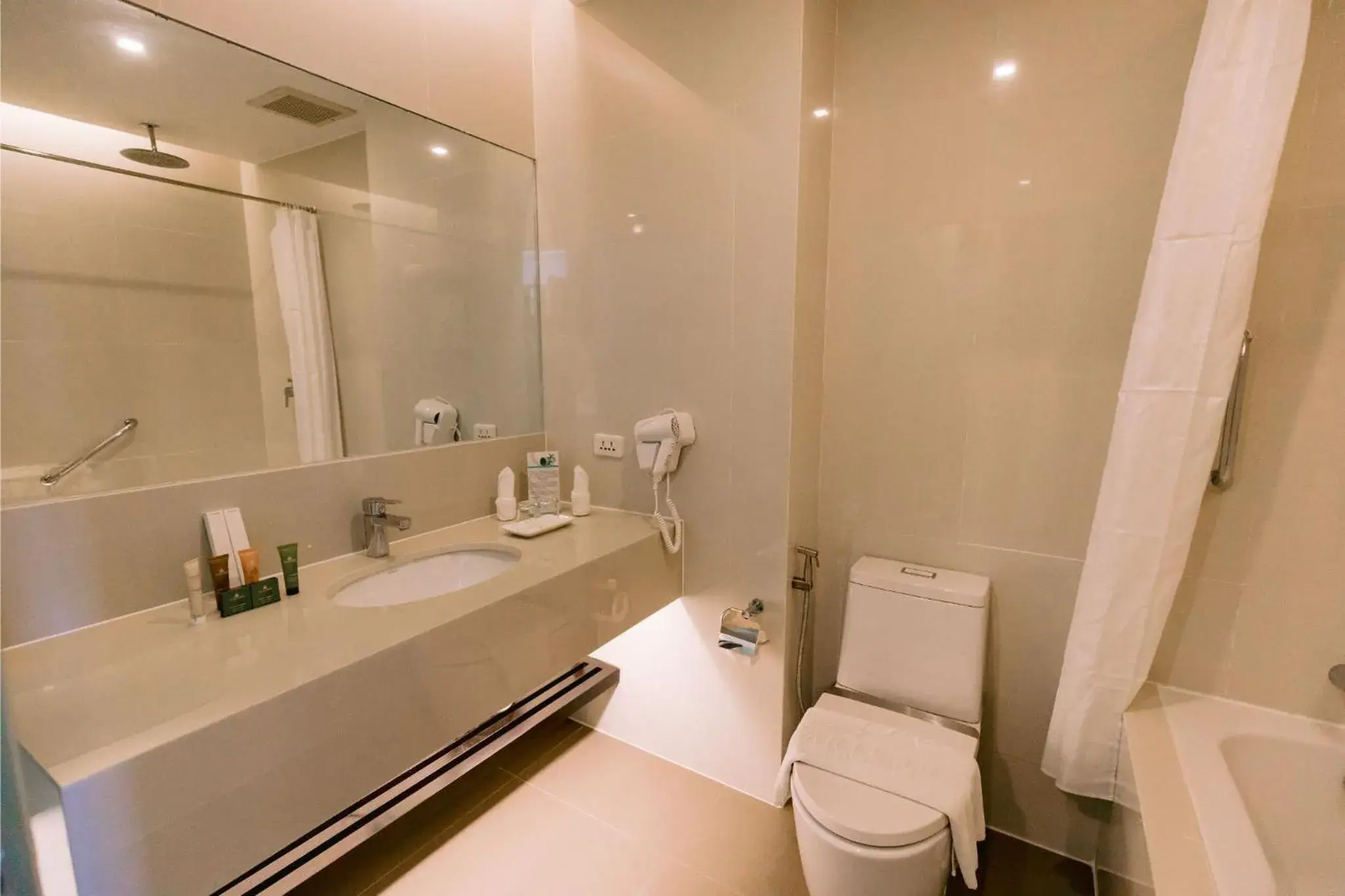 Toilet in Arterra Seaview Resort Toilet in Arterra Seaview Resort