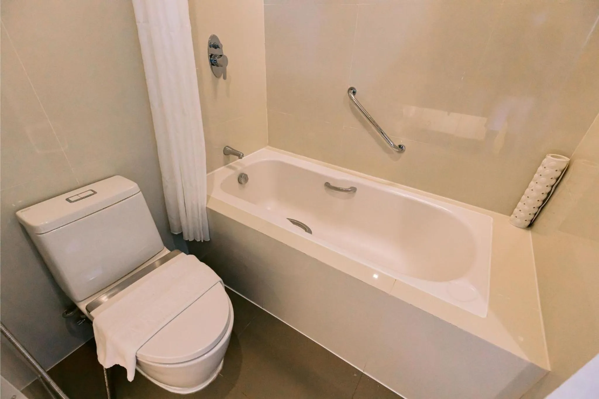 Toilet in Arterra Seaview Resort