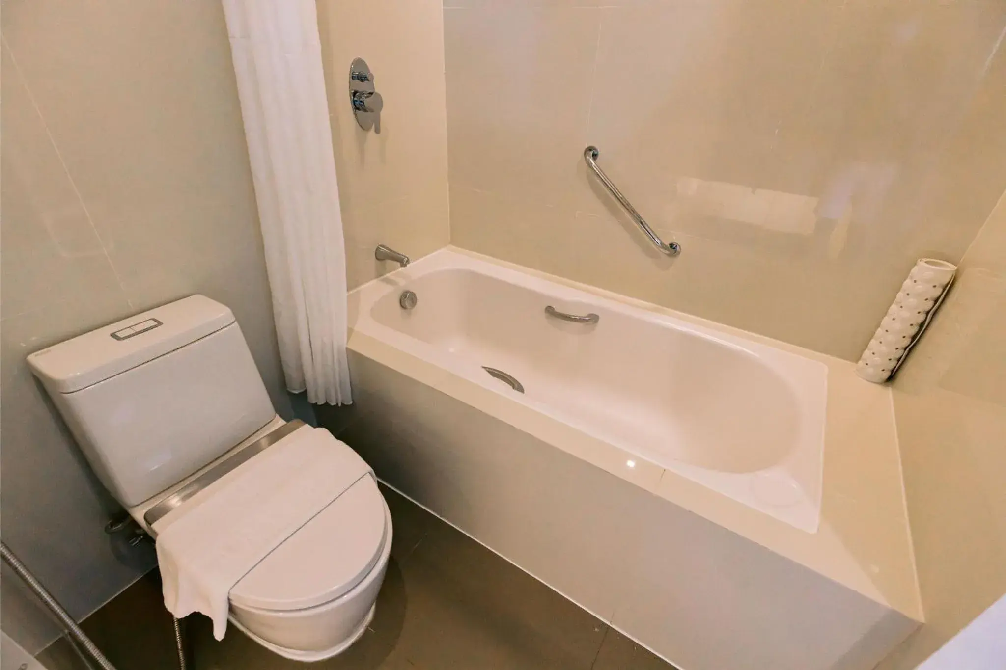 Toilet in Arterra Seaview Resort Toilet in Arterra Seaview Resort