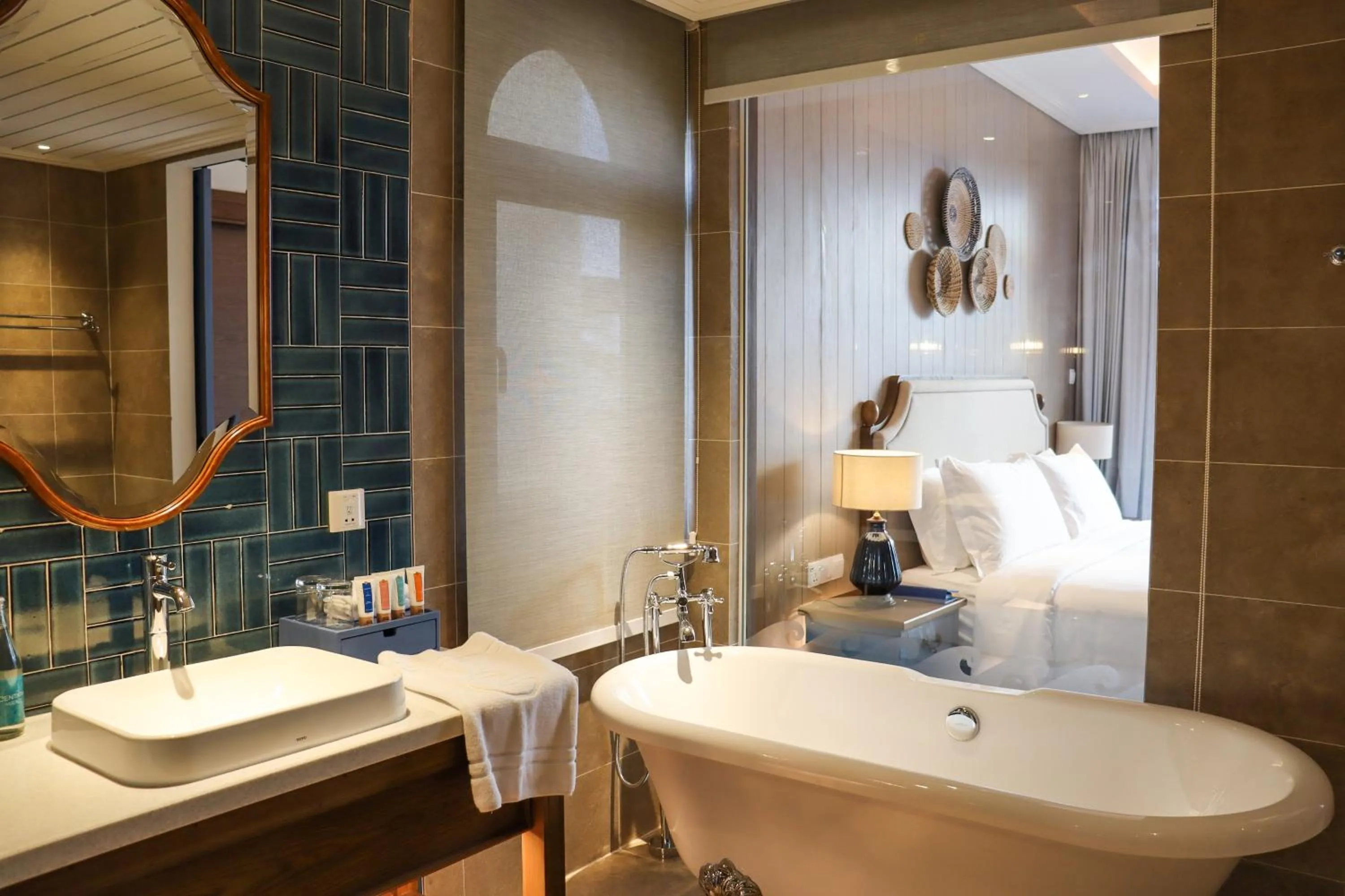 Bathroom, Bed in Centara Mirage Resort Mui Ne