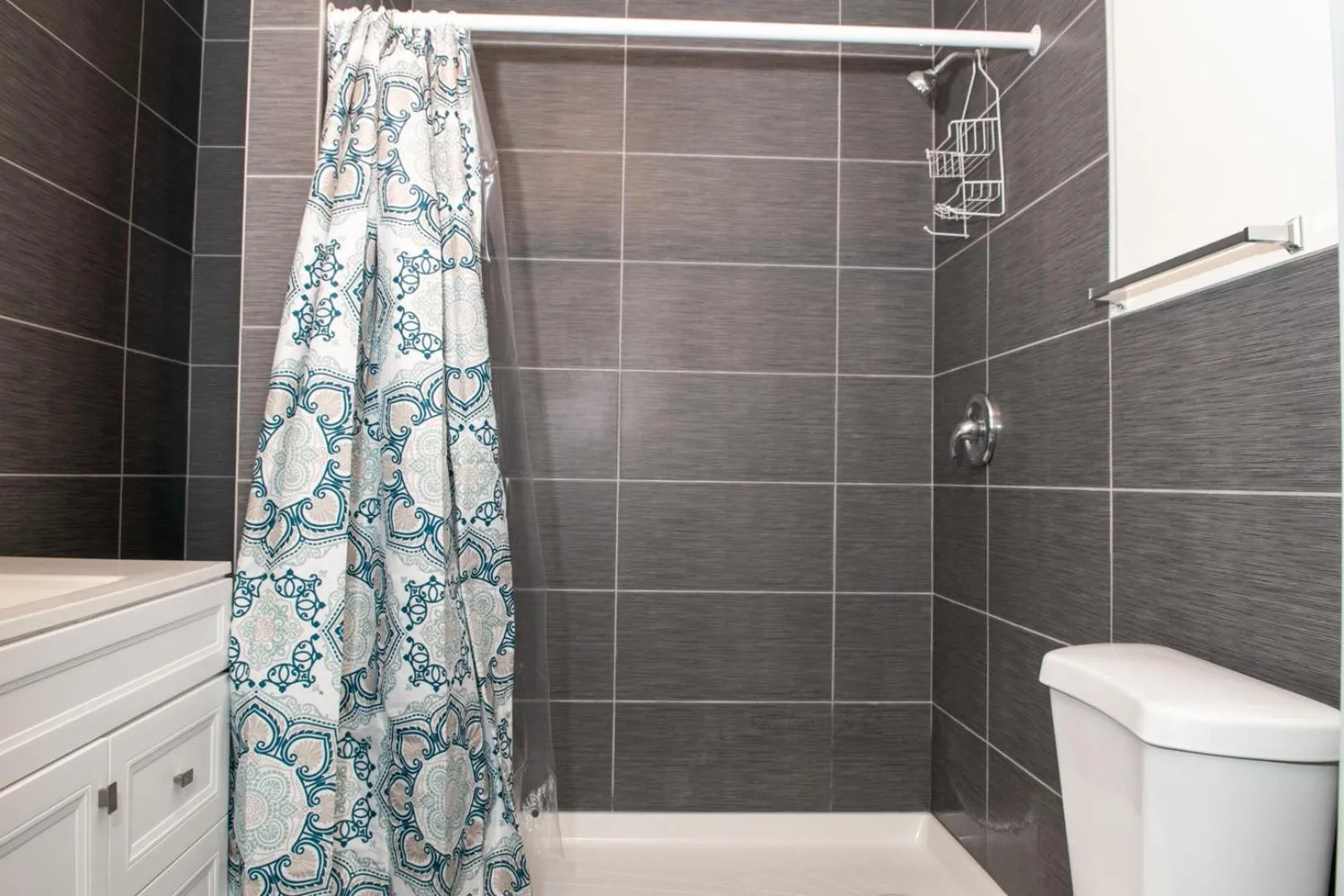 Bathroom in The Eastside Manor- With Private Yard & Free Parking, Minutes From Falls & Casino by Niagara Hospitality