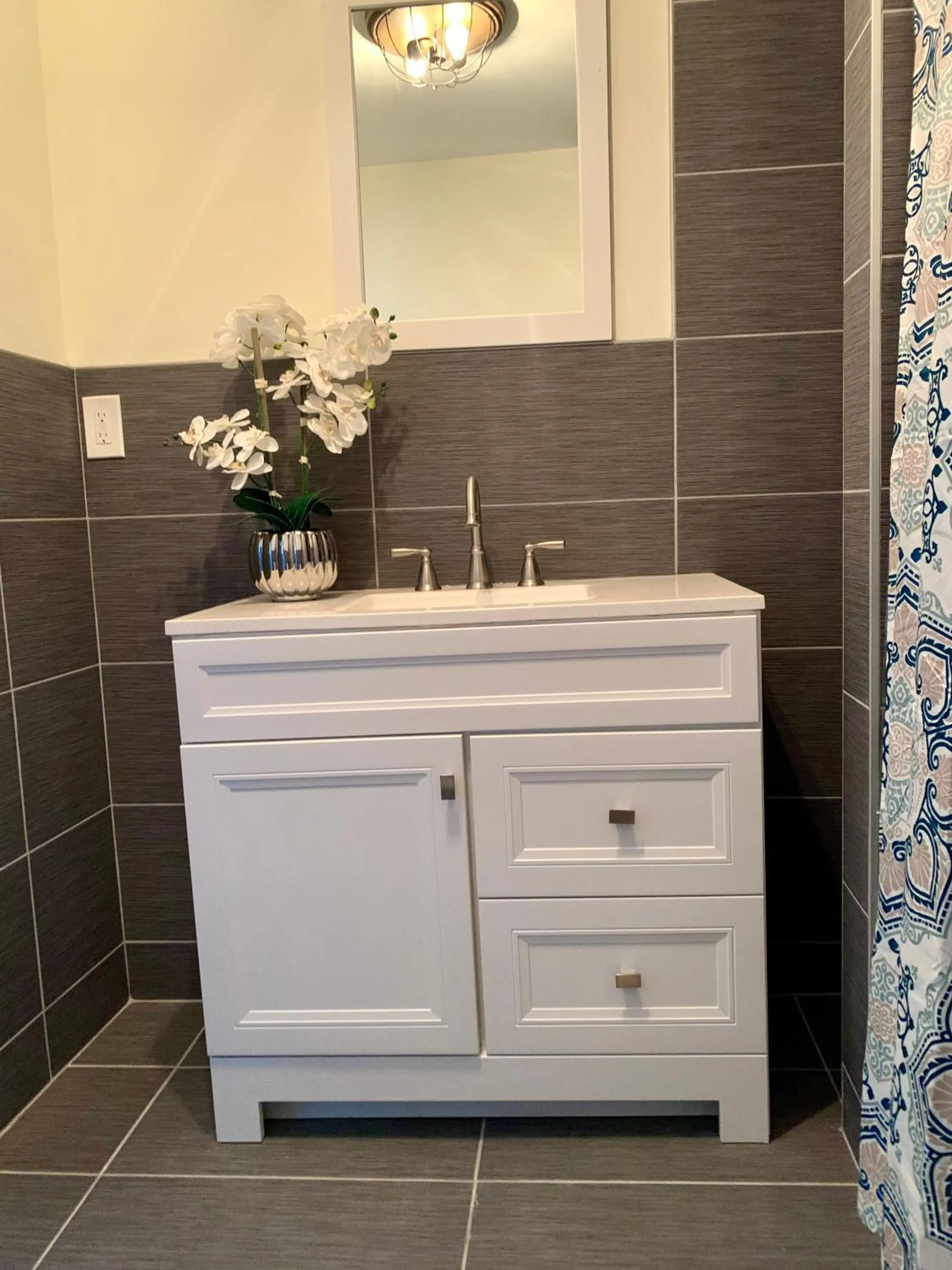 Bathroom in The Eastside Manor- With Private Yard & Free Parking, Minutes From Falls & Casino by Niagara Hospitality