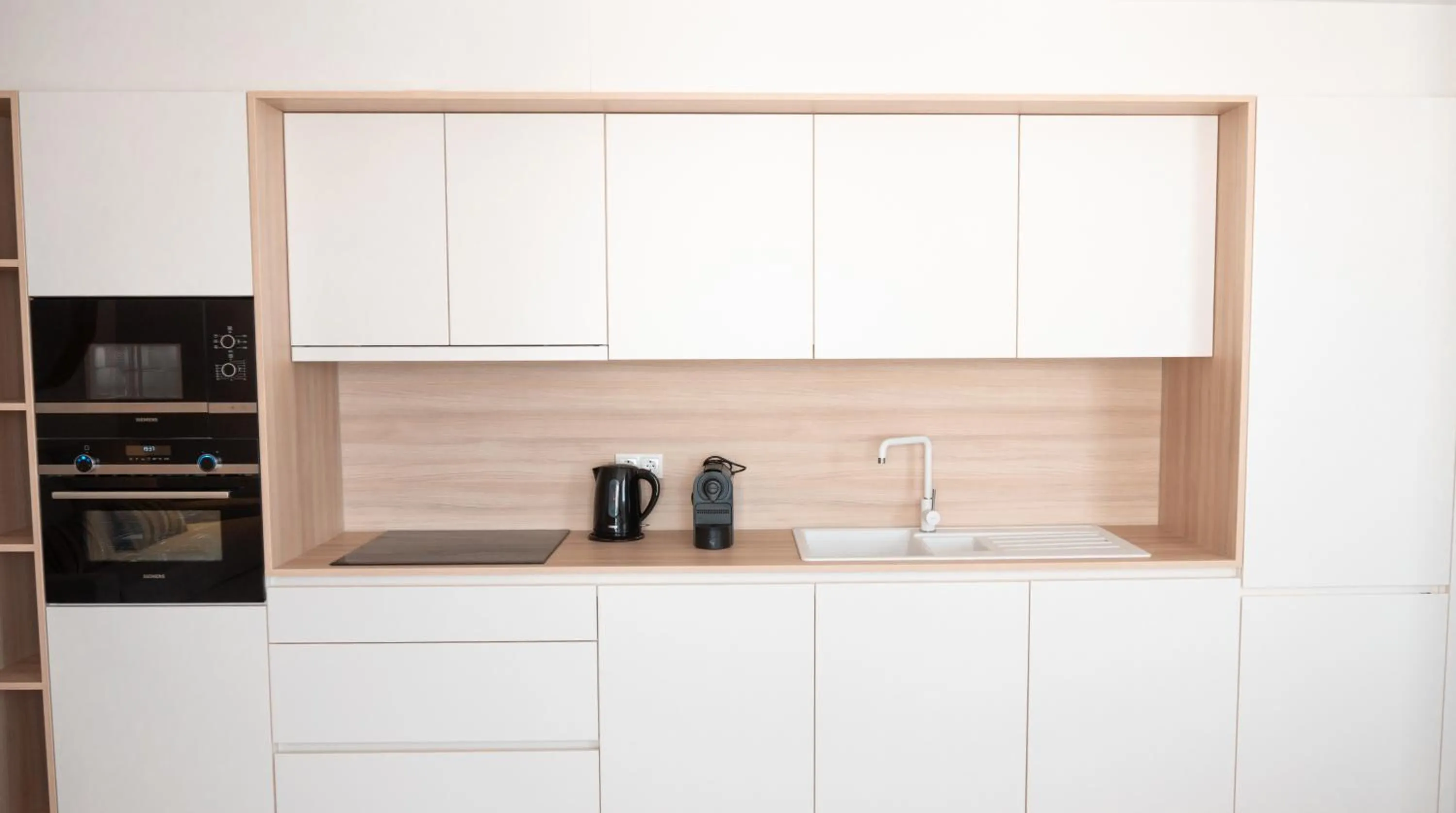 Kitchen or kitchenette in Portomar Apartments - 4-Star Superior Hotel