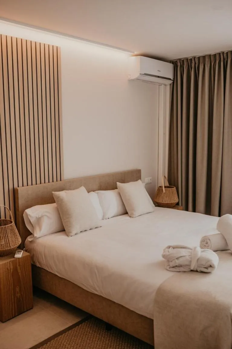 Bed in Portomar Apartments - 4-Star Superior Hotel