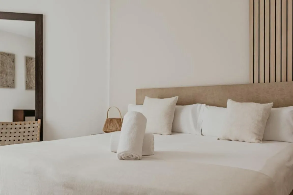 Bed in Portomar Apartments - 4-Star Superior Hotel