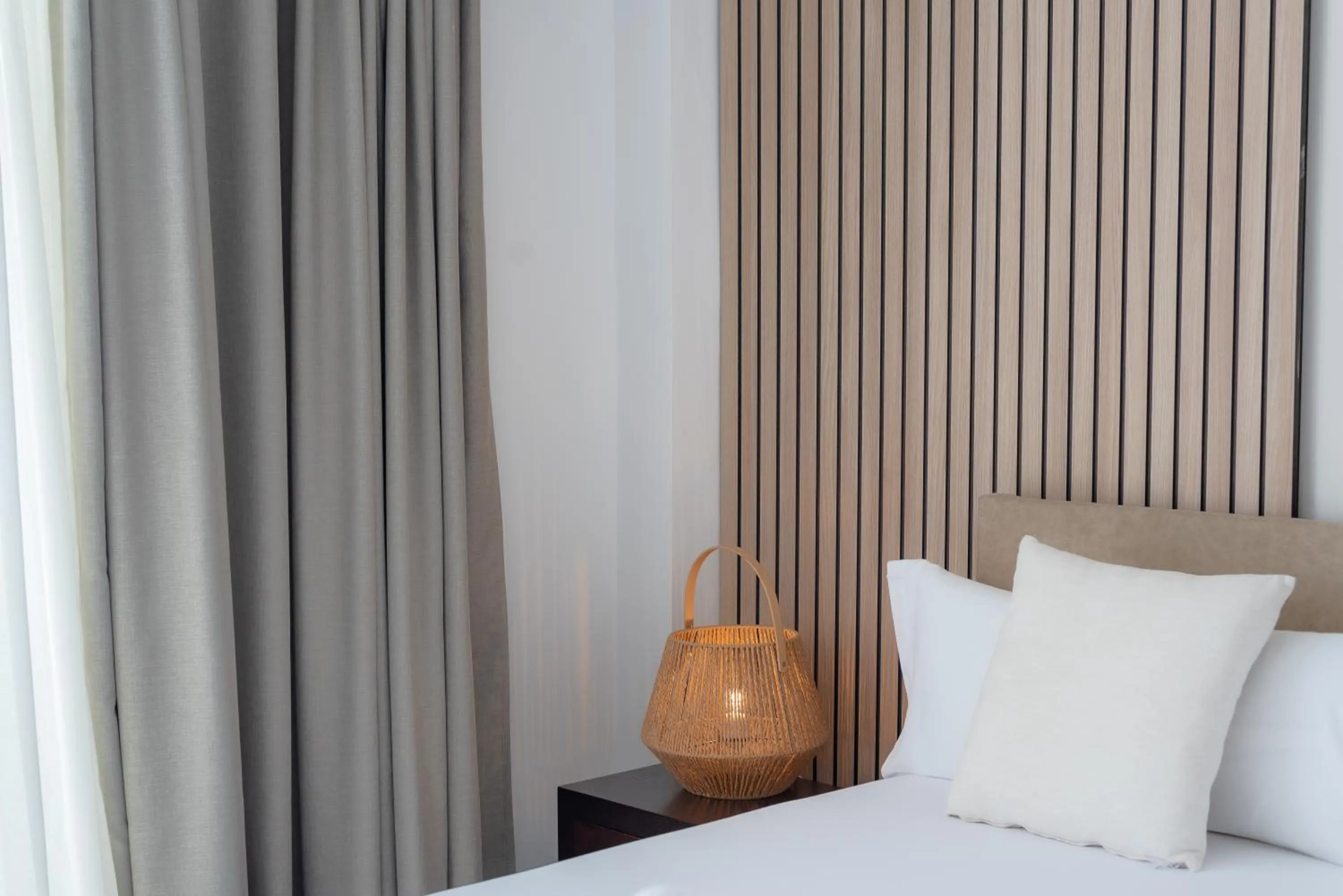 Bed in Portomar Apartments - 4-Star Superior Hotel