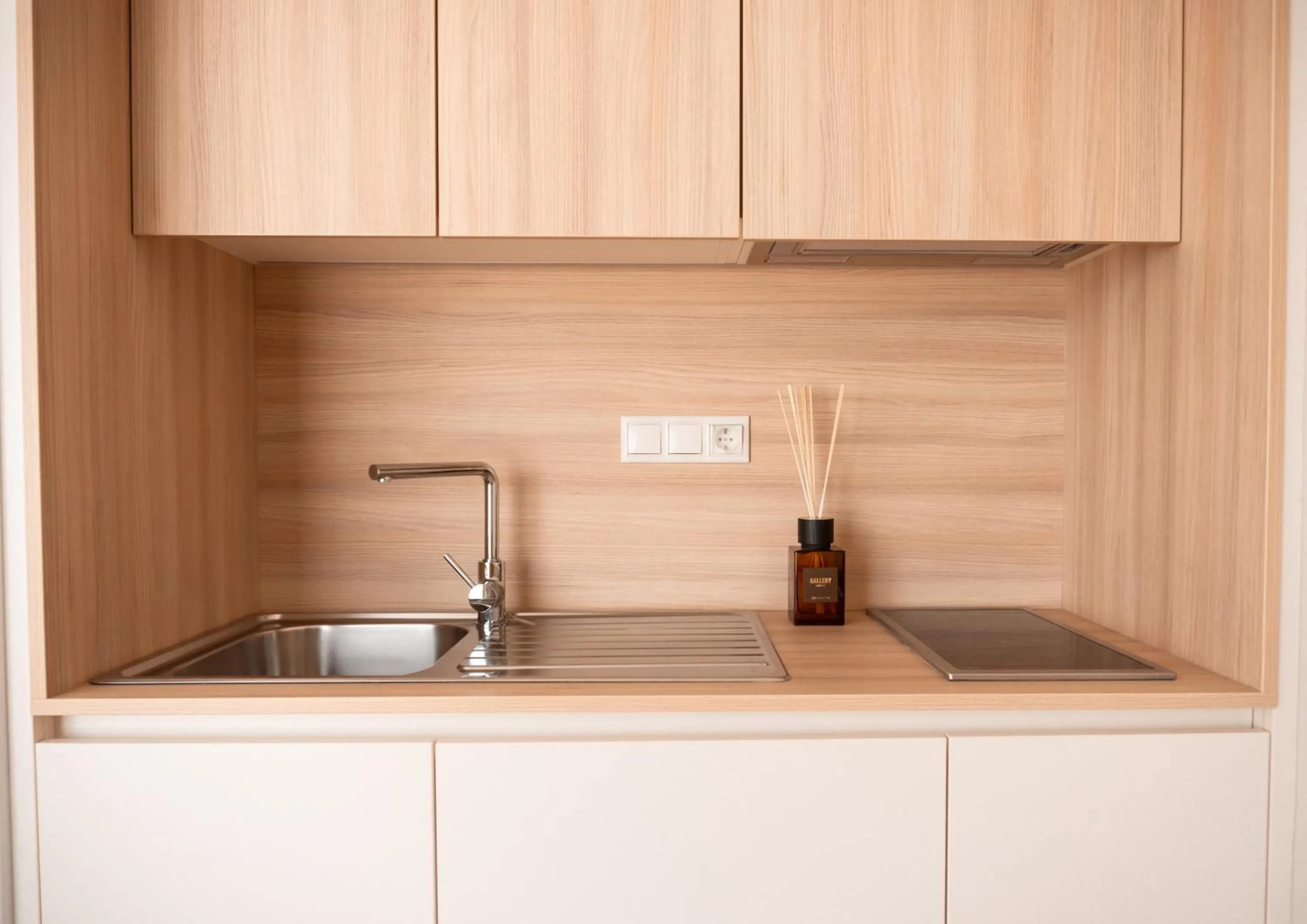 Kitchen or kitchenette in Portomar Apartments - 4-Star Superior Hotel