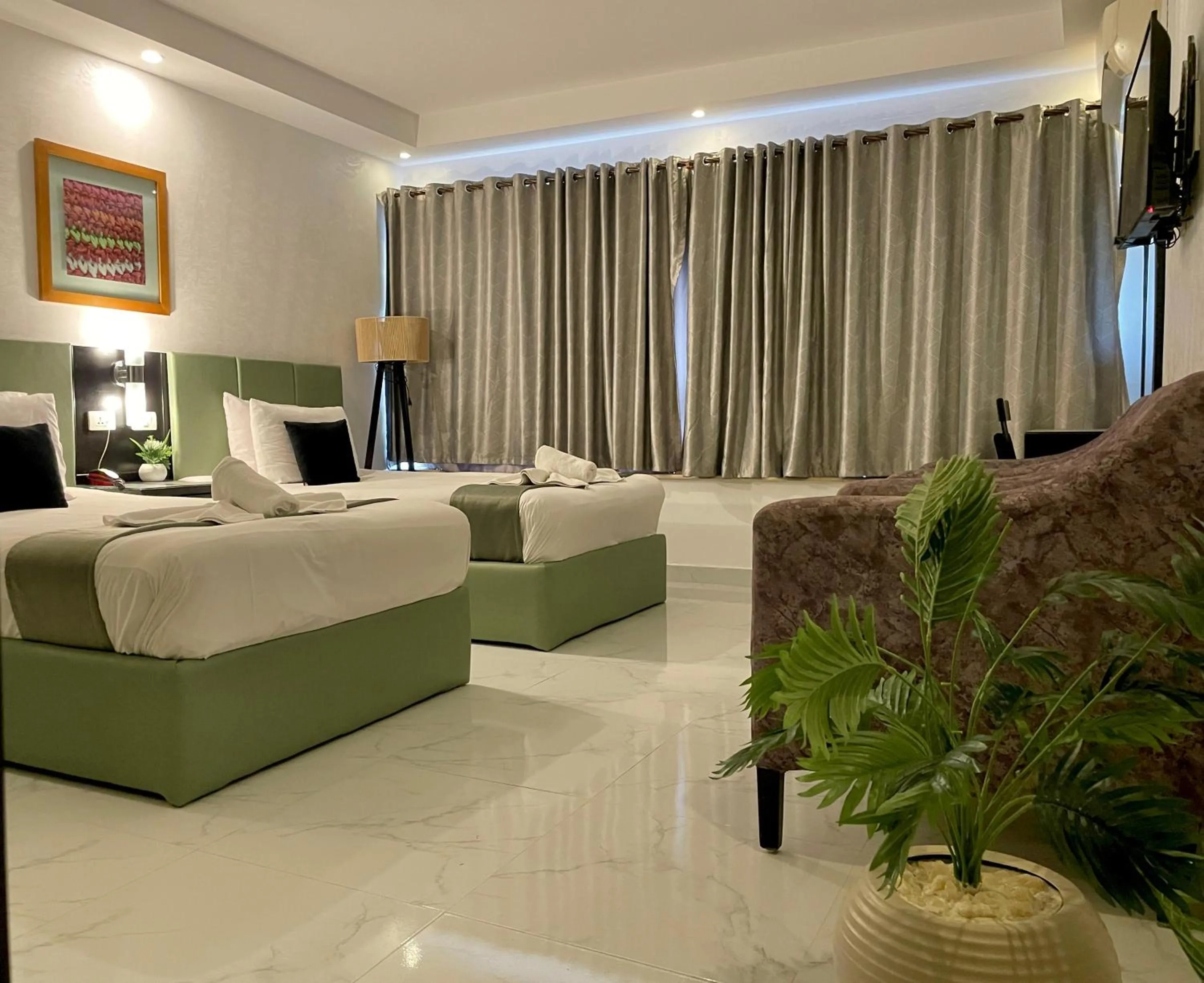 Deluxe Double Room (2 Adults + 1 Child) in Nile View Inn