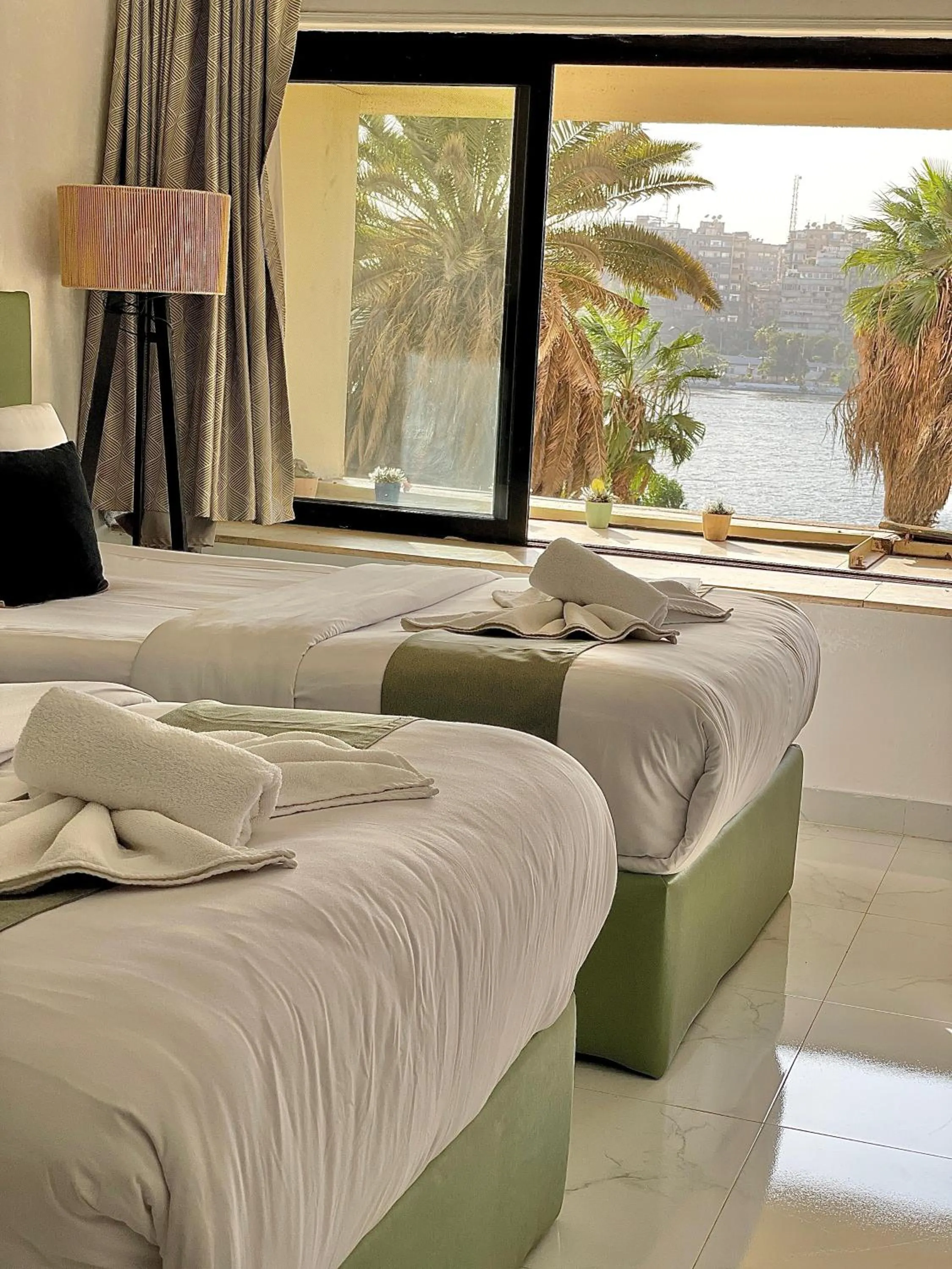 Deluxe Double Room (2 Adults + 1 Child) in Nile View Inn