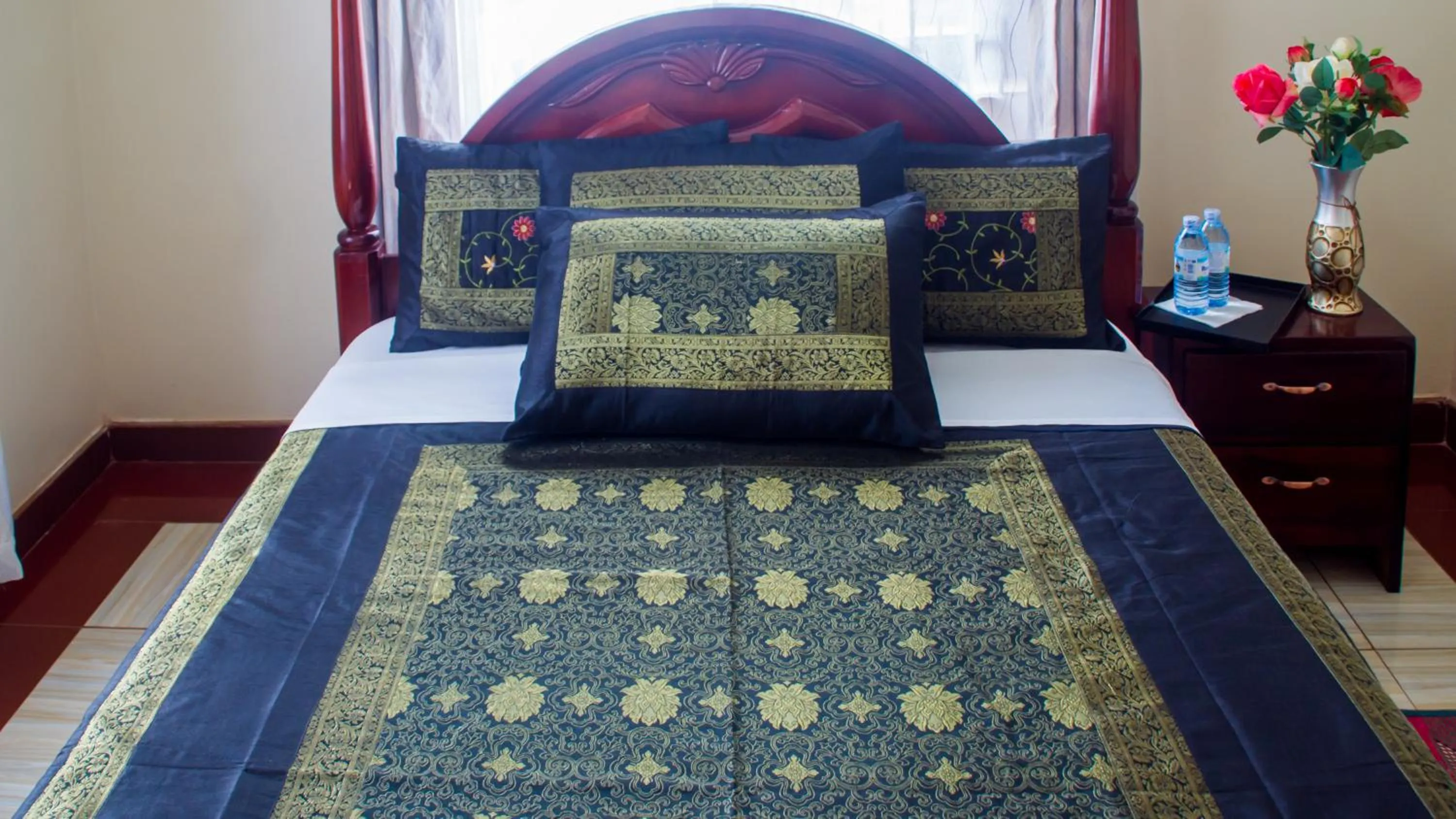 Bed in Bona Safari Villa Bunamwaya