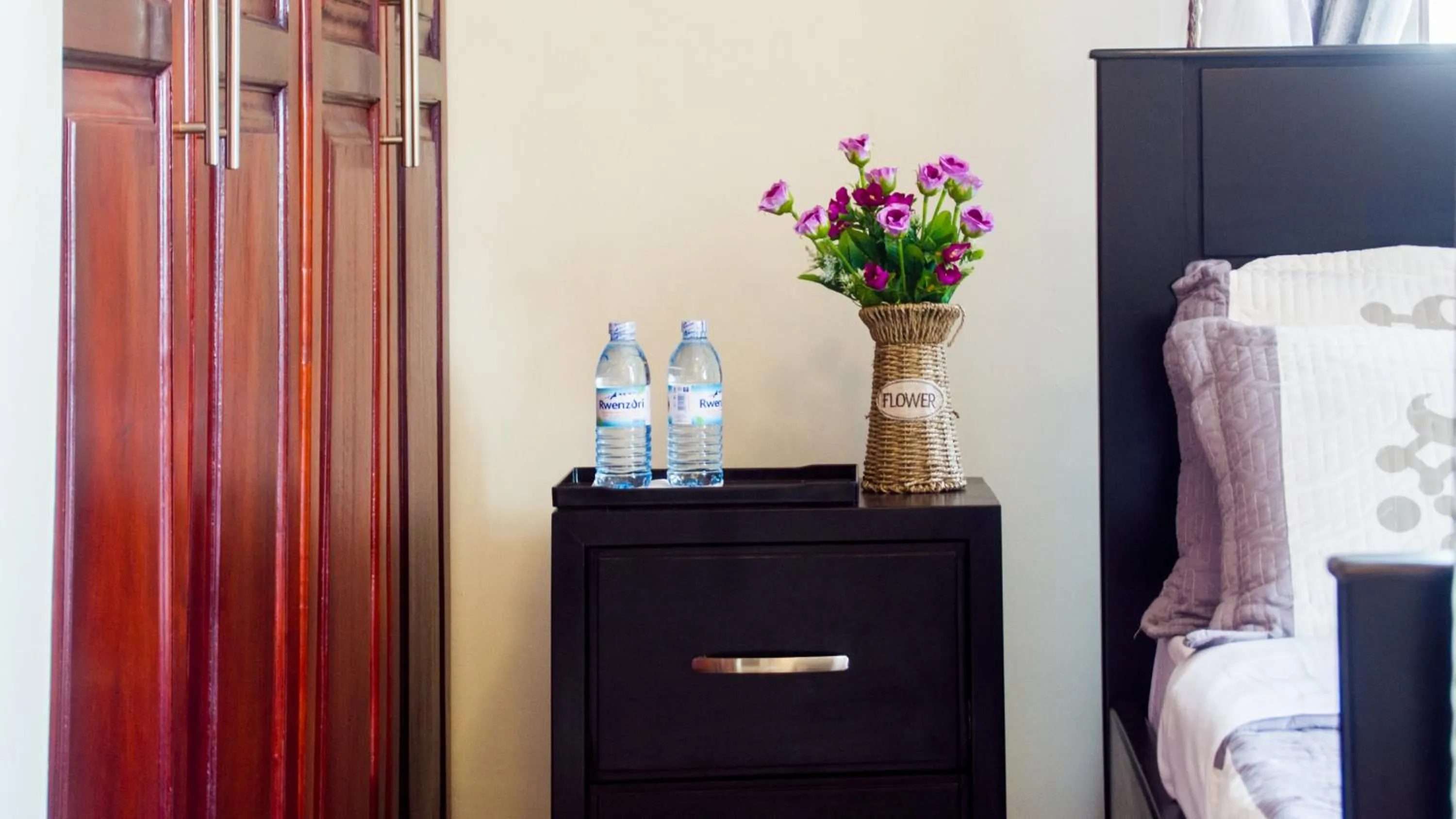 Bed in Bona Safari Villa Bunamwaya