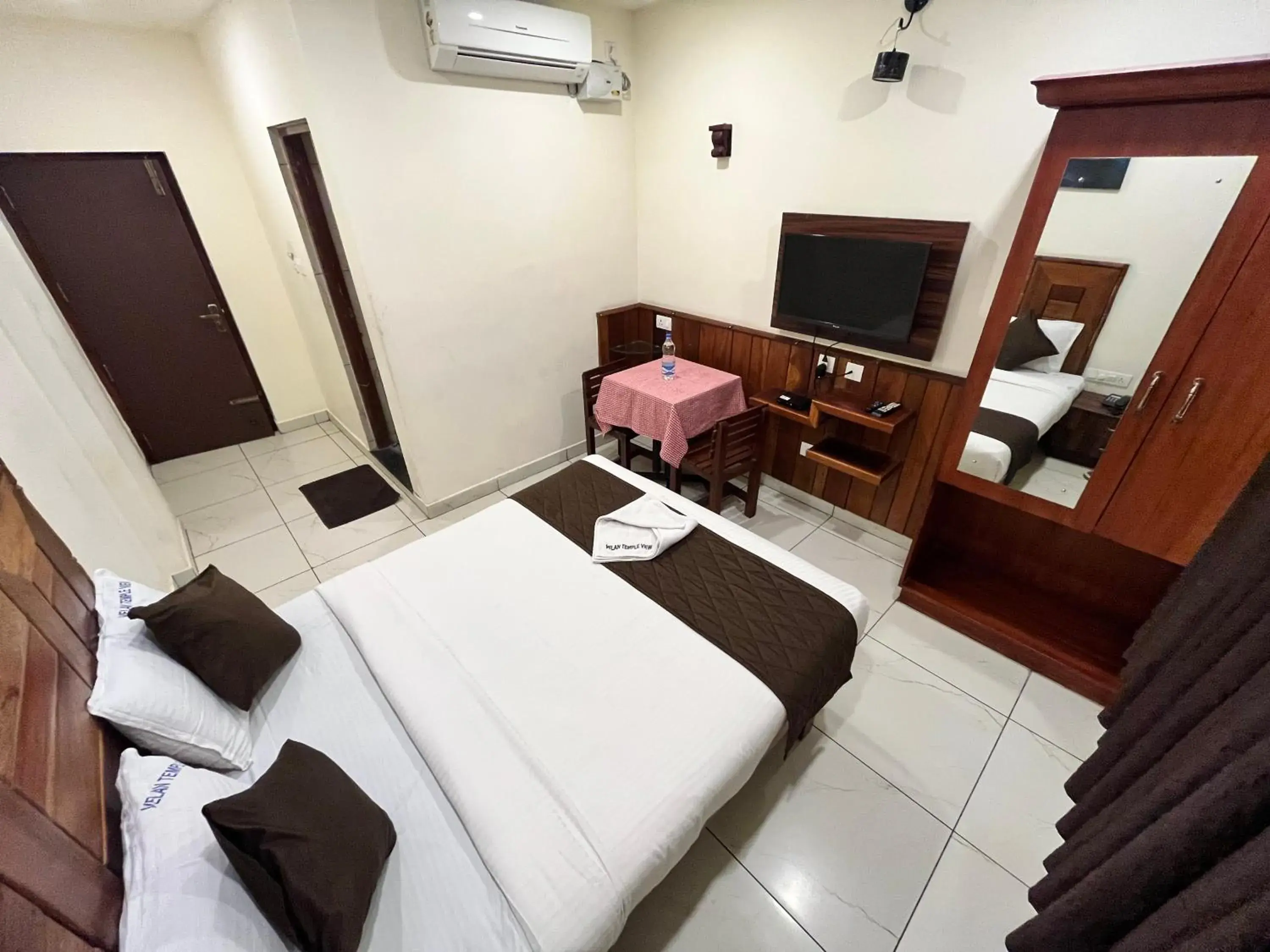 Photo of the whole room, Bed in Velan Temple View Photo of the whole room, Bed in Velan Temple View