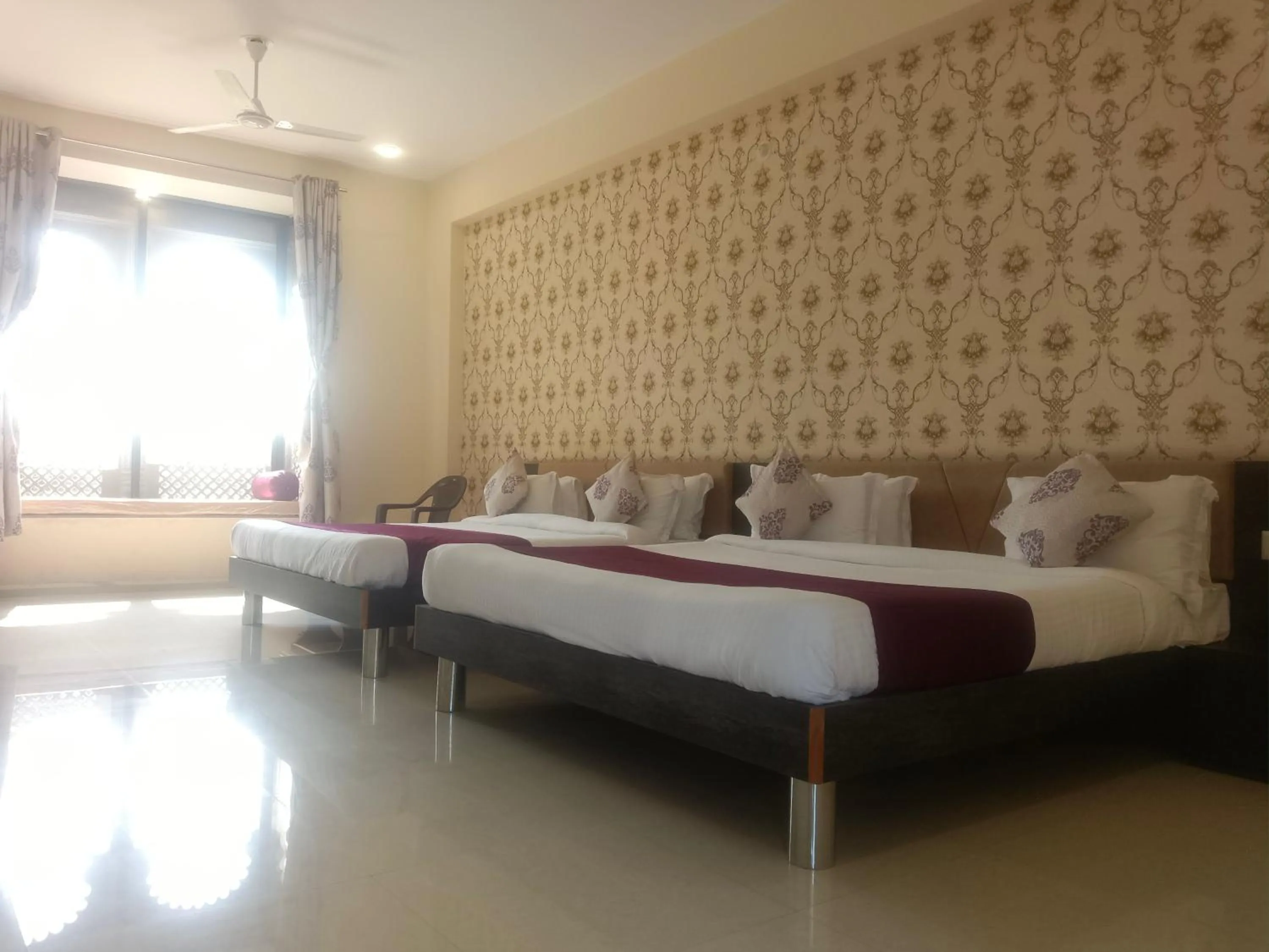 Bed in Vijayam Resort