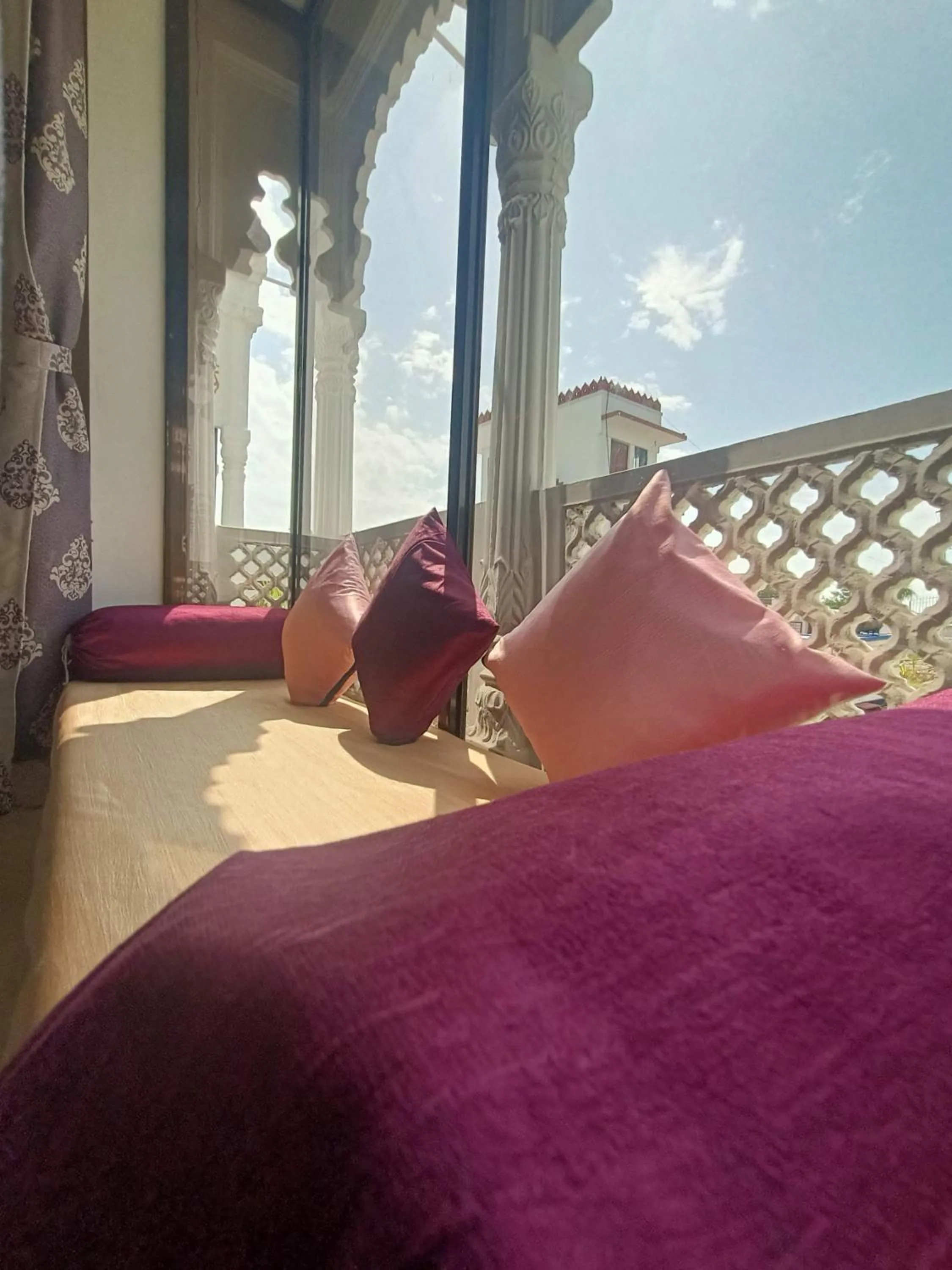 Bed in Vijayam Resort