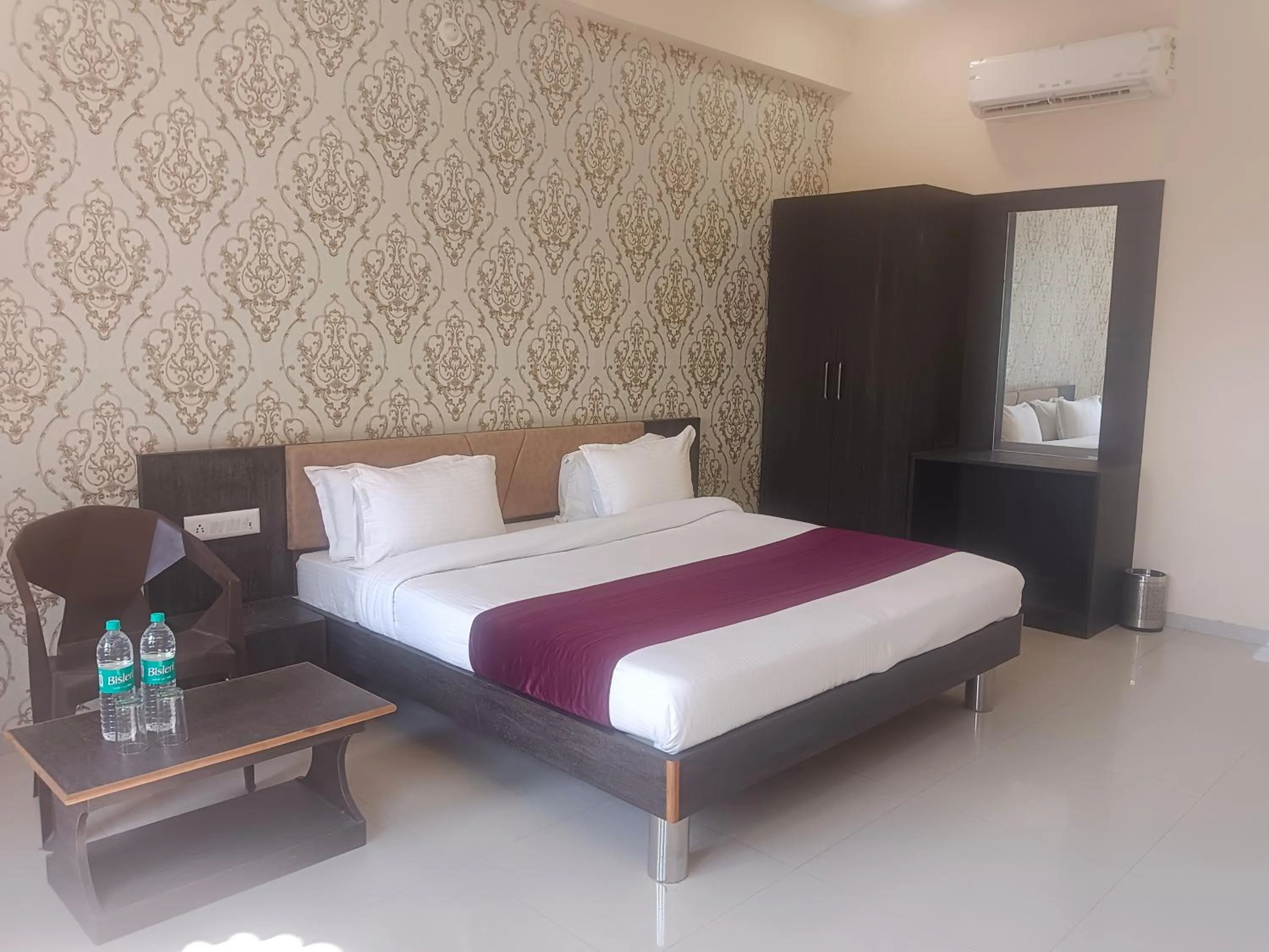 Bed in Vijayam Resort