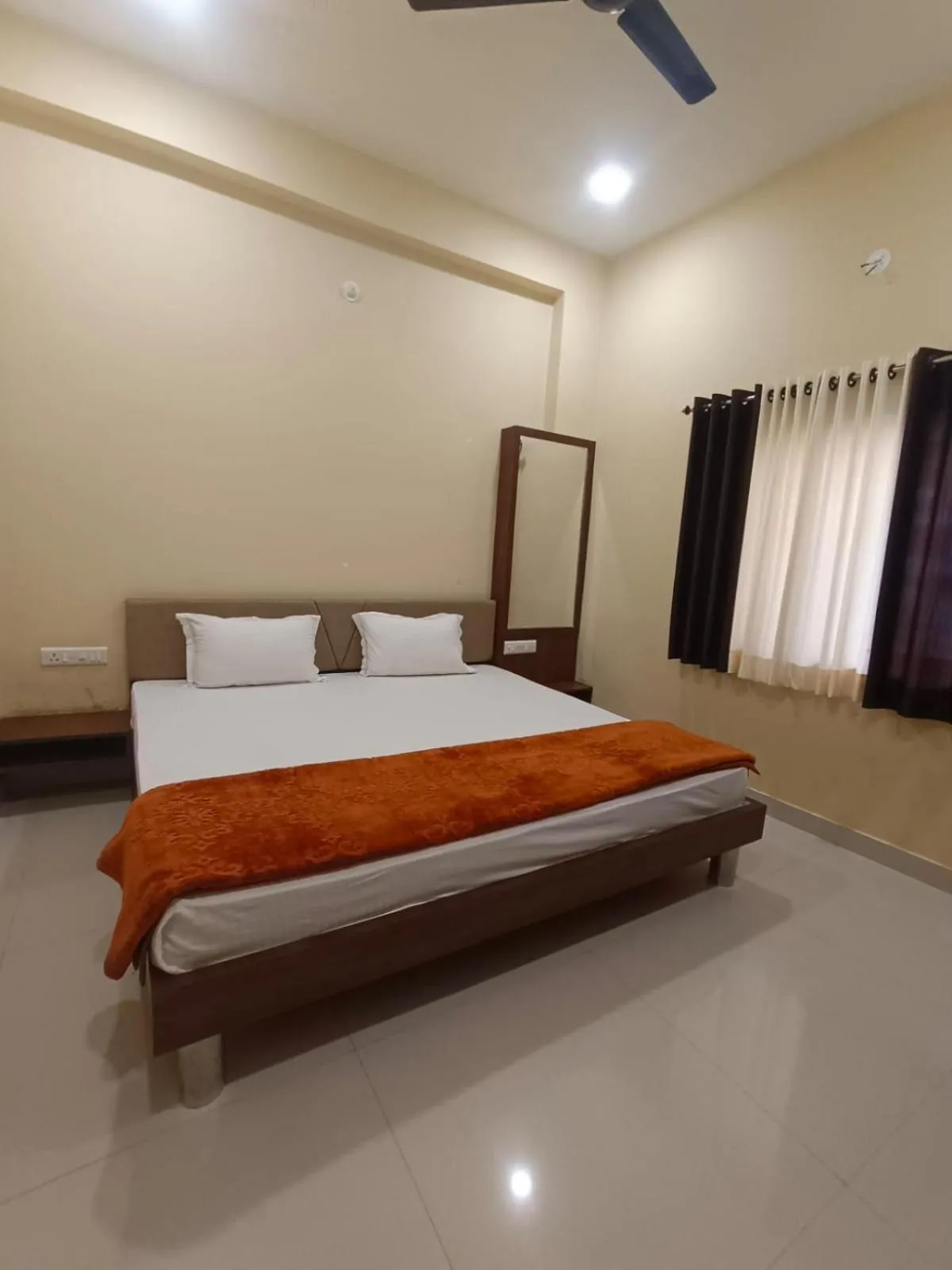 Bed in Vijayam Resort