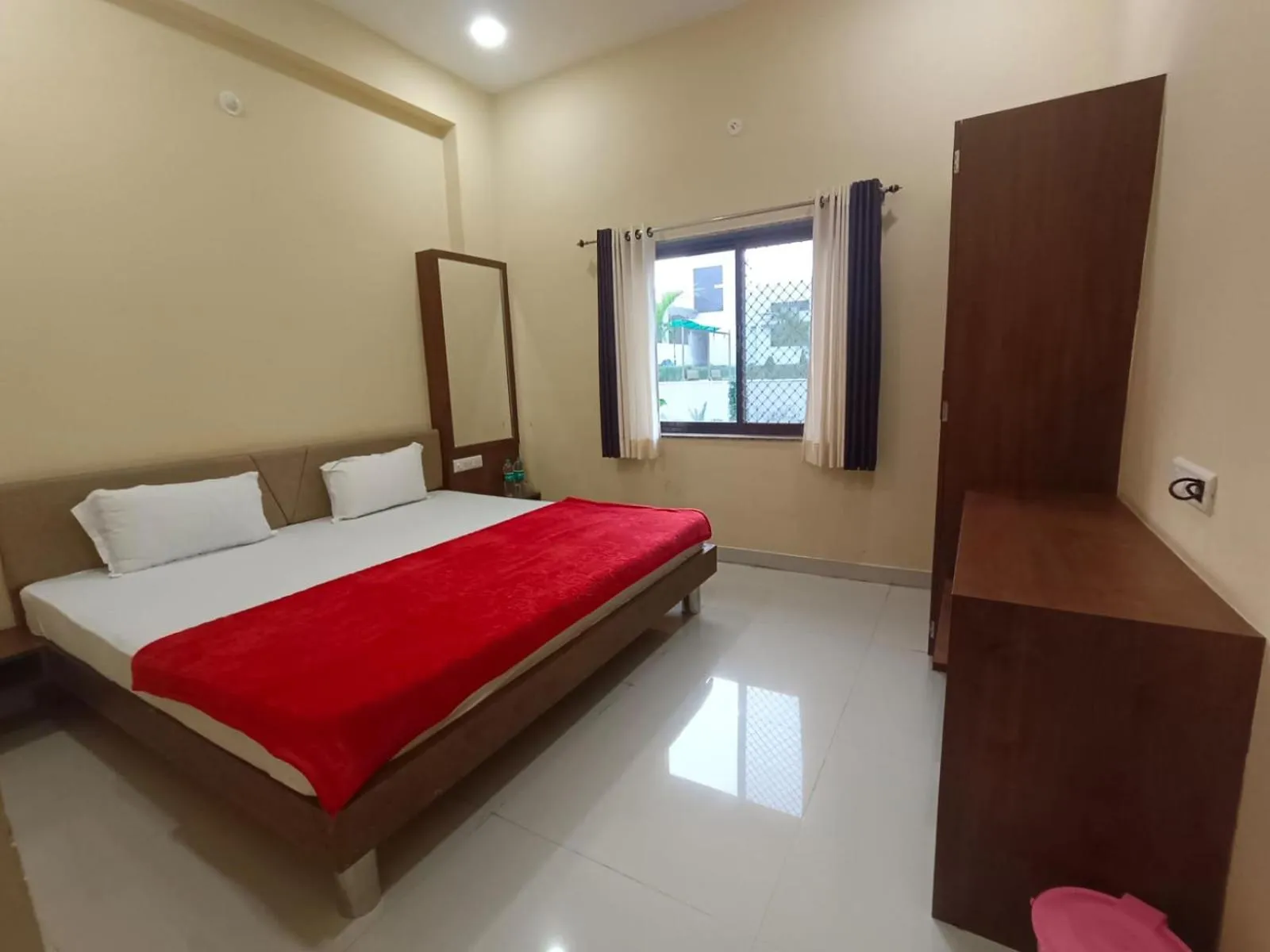 Bed in Vijayam Resort