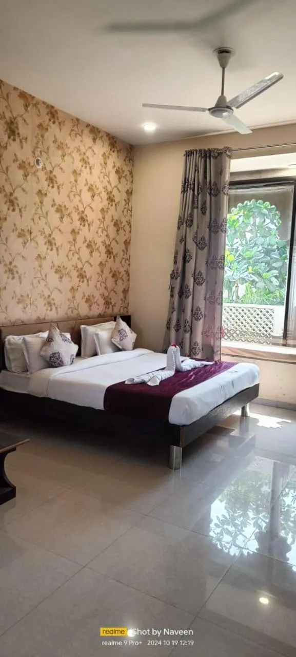 Bed in Vijayam Resort