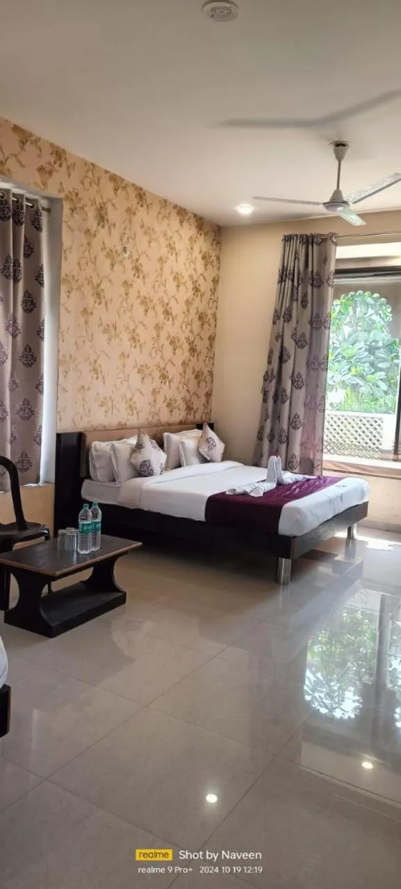 Bed in Vijayam Resort