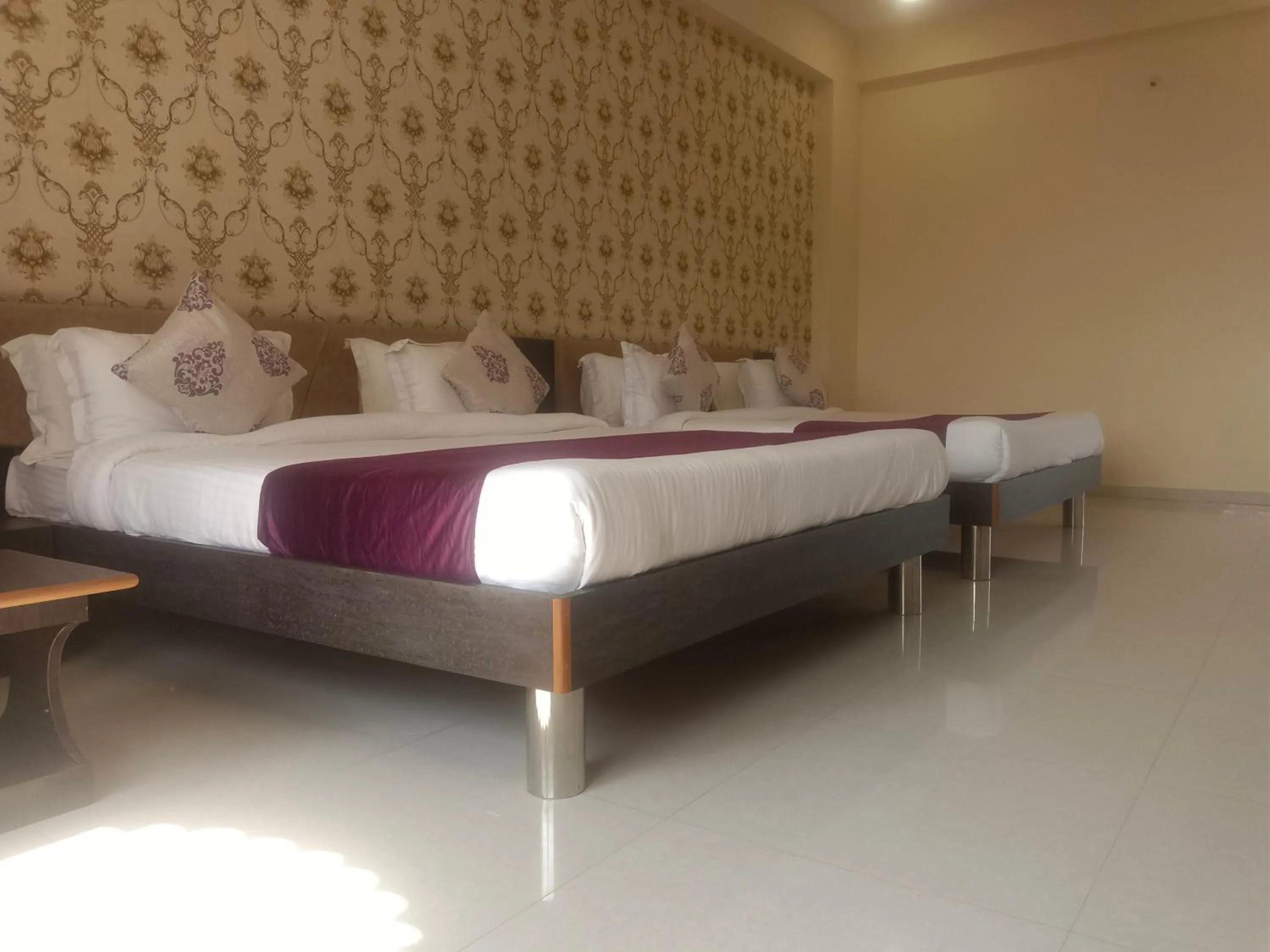 Bed in Vijayam Resort