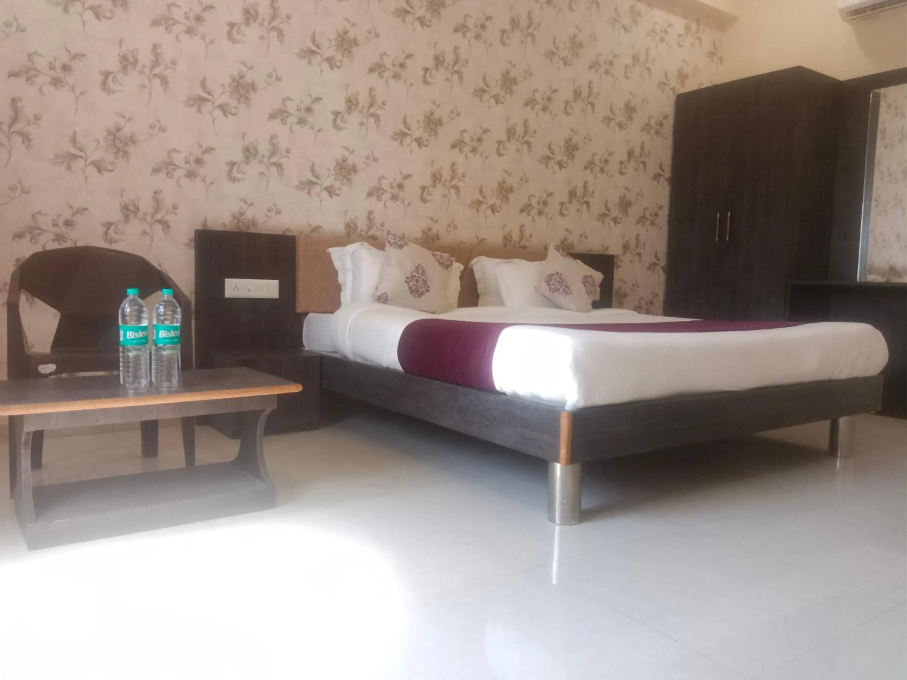 Bed in Vijayam Resort