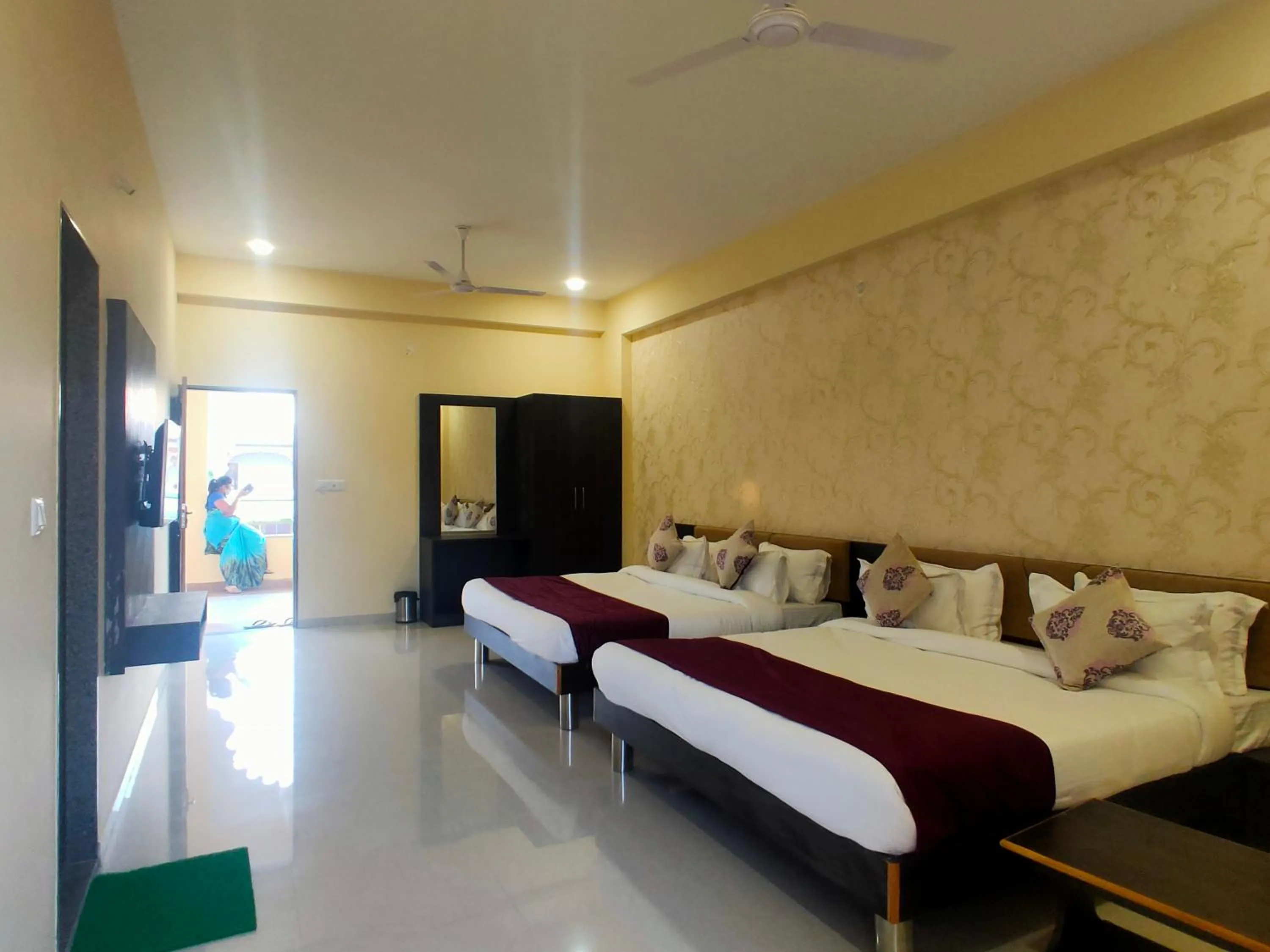 Bed in Vijayam Resort